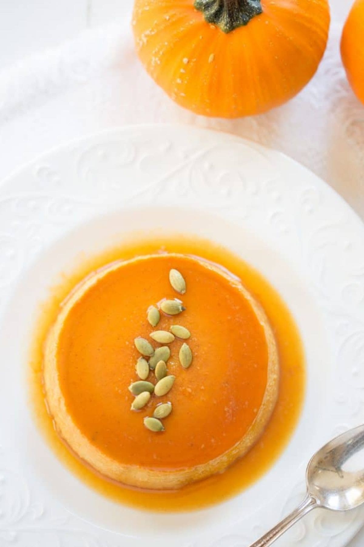 Pumpkin caramel flan on a plate ready to serve.