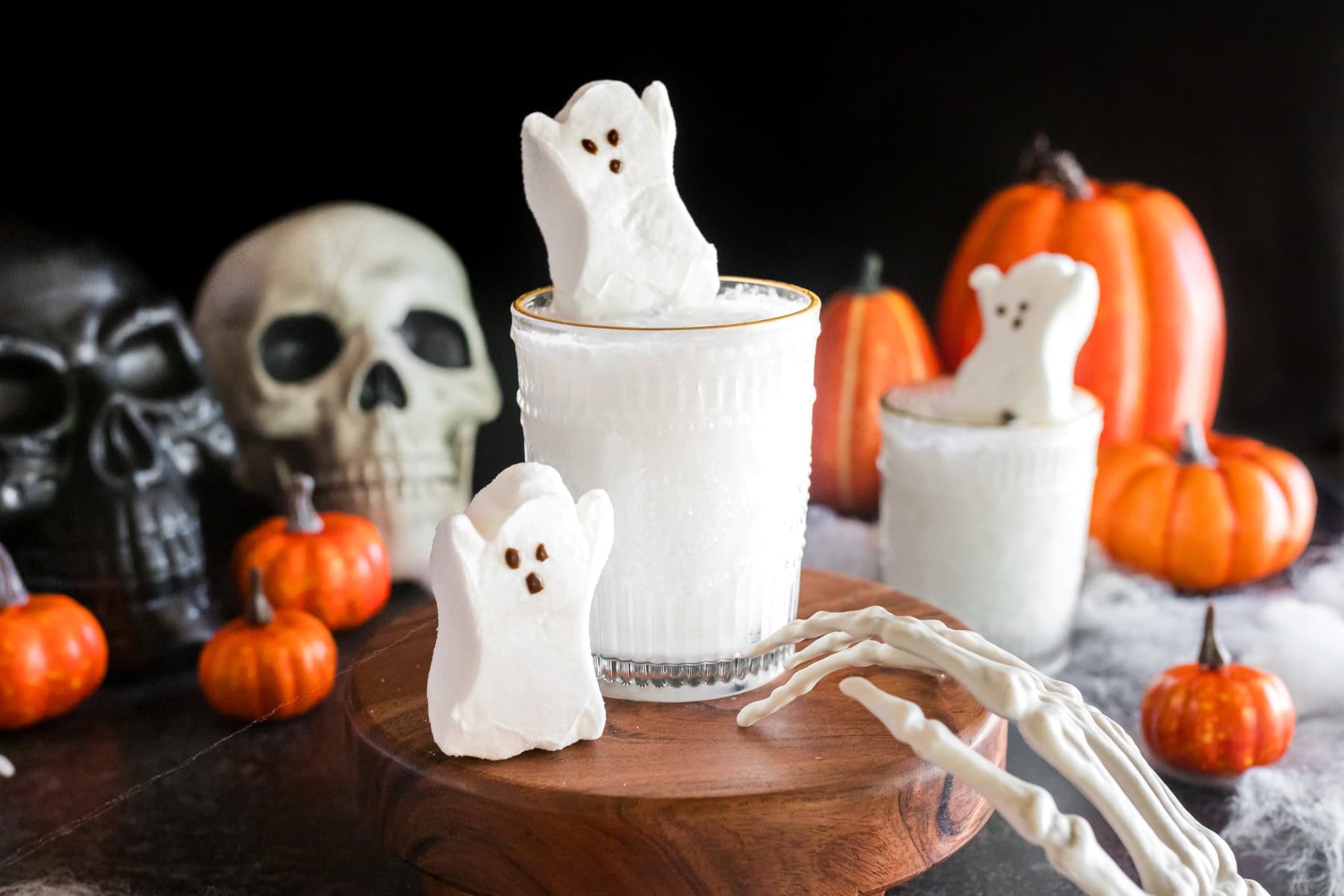 Horizontal picture of ghost cocktails with marshmallow ghosts. 