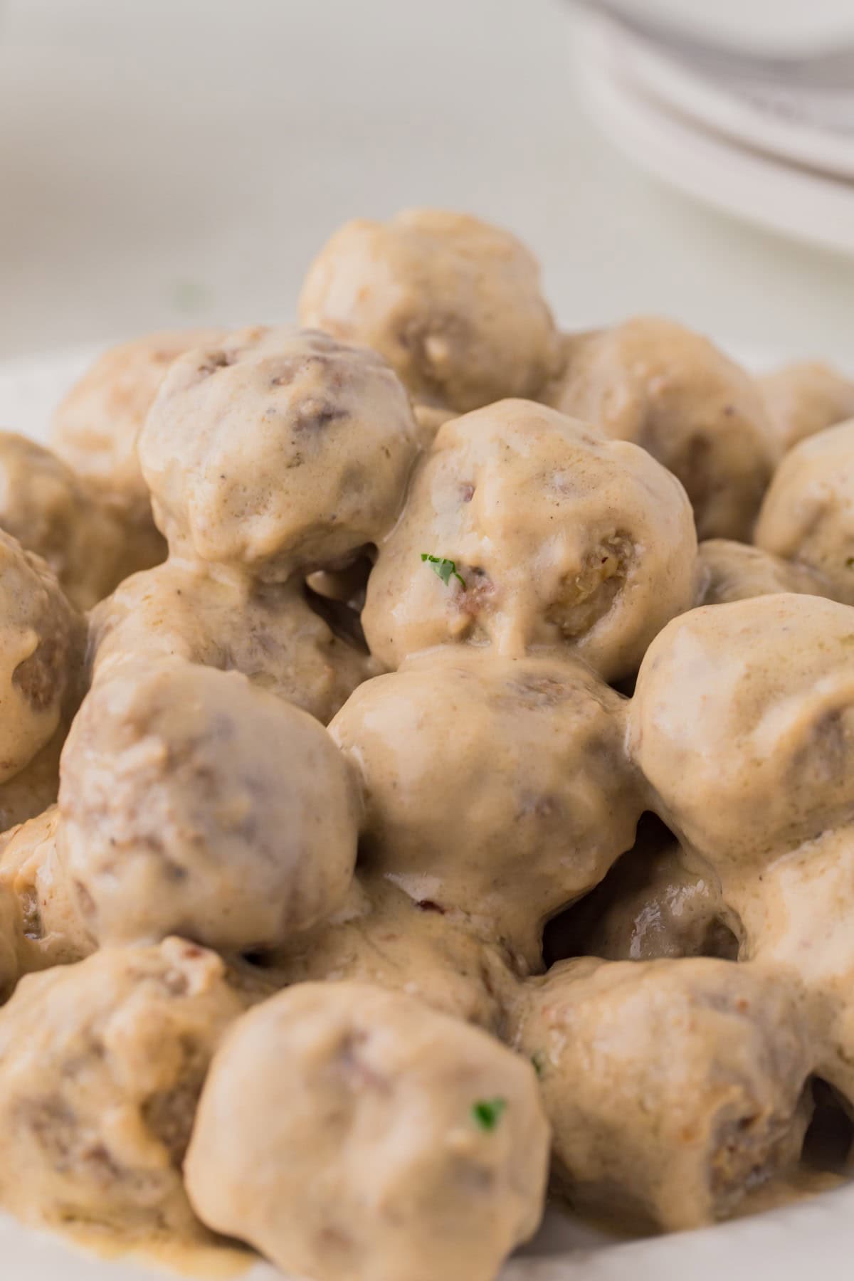 This Swedish Meatball Recipe is piled high on a plate. 