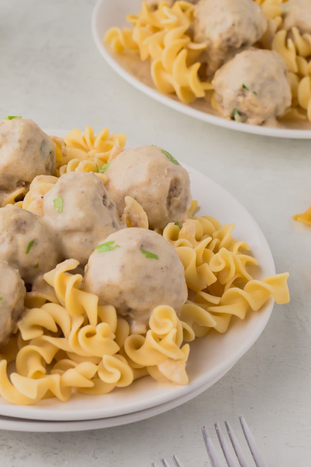 Meatballs over egg noodles. 