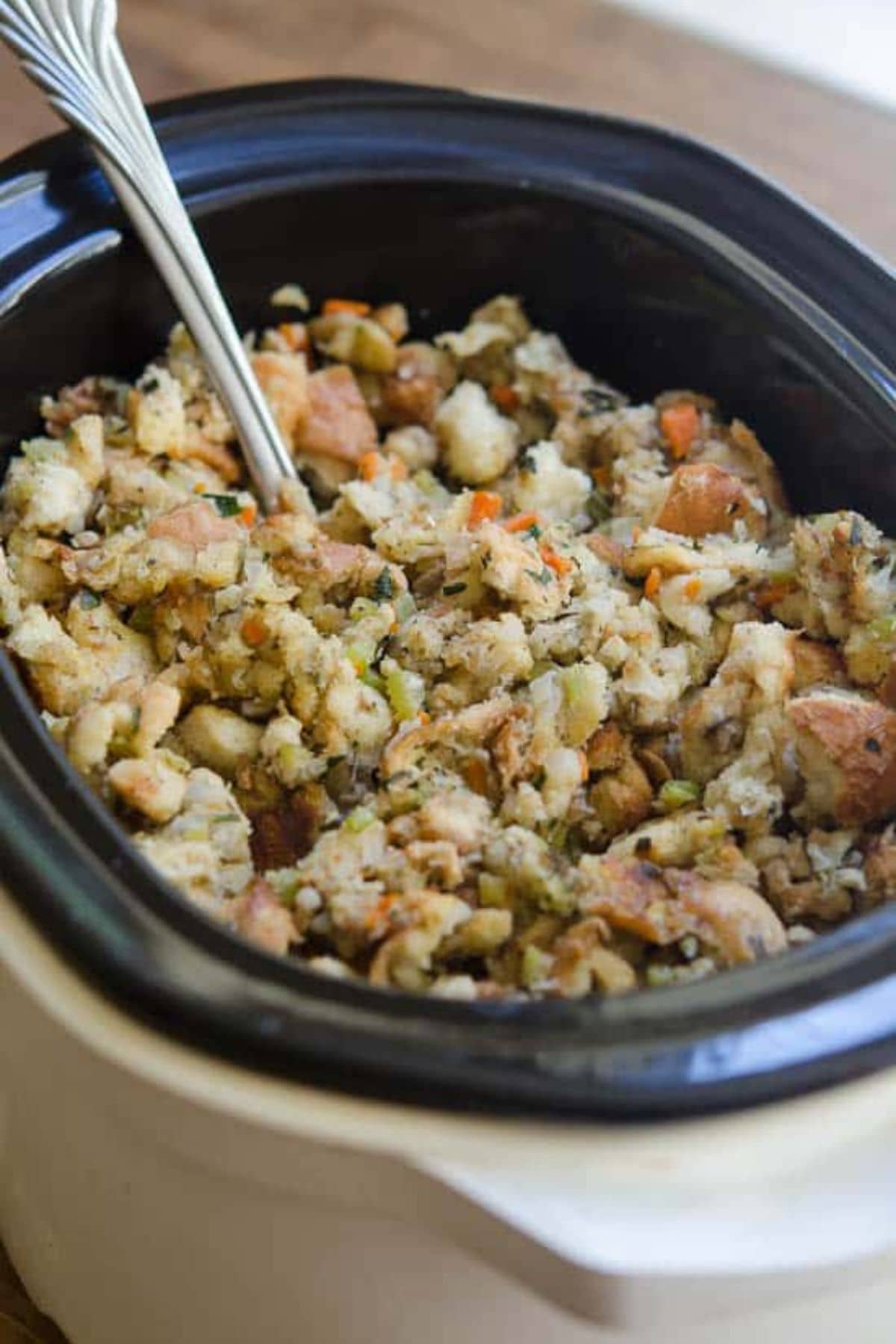 Crock-pot filled with stuffing ready to be served.