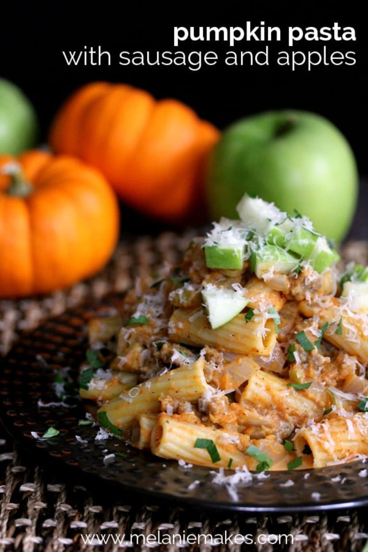 Serving of pumpkin pasta on a plate.