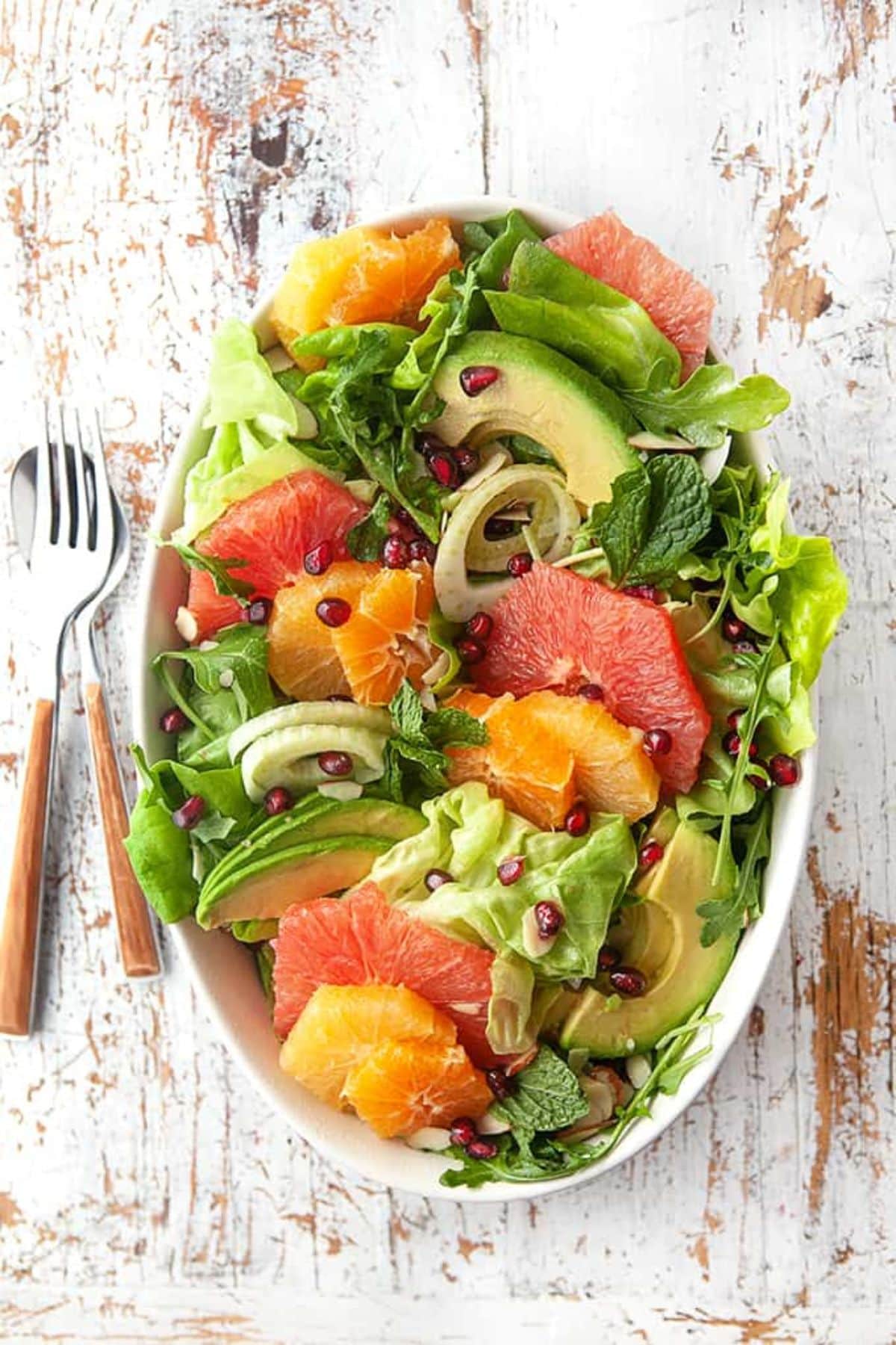 Large serving bowl full of winter citrus salad.