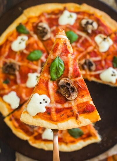 Close-up of a slice of Halloween pizza.