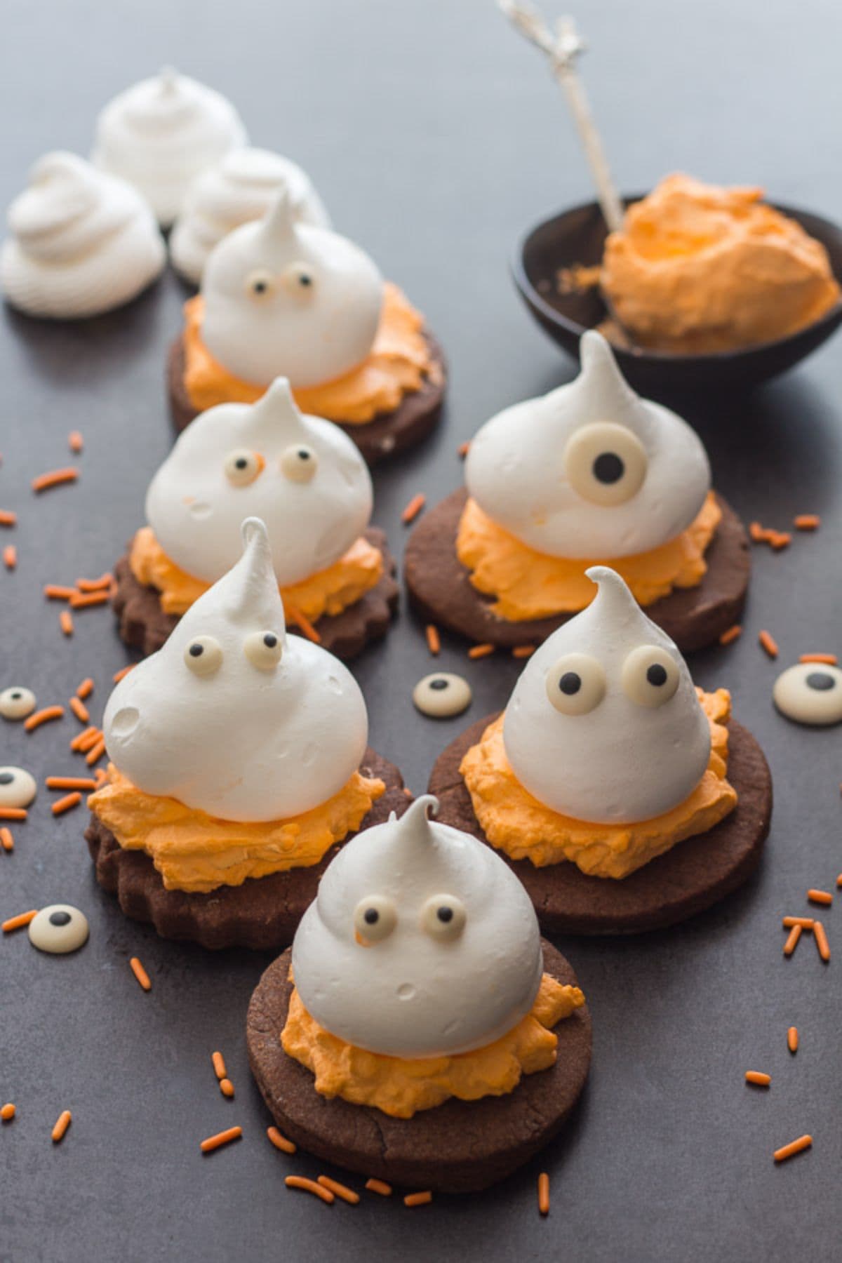 Meringue Ghost Chocolate Sugar Cookies on a dark background.