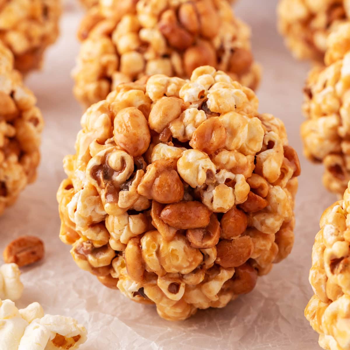 Square image of a popcorn ball close-up. 