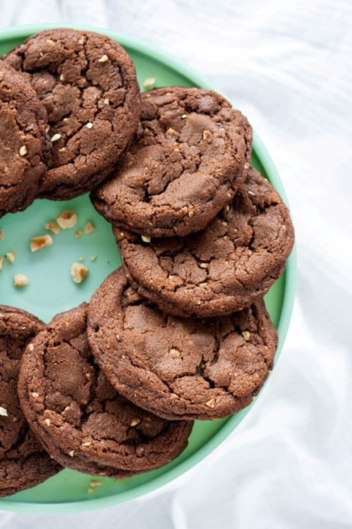 Chocolate hanzelnut cookies on plate.