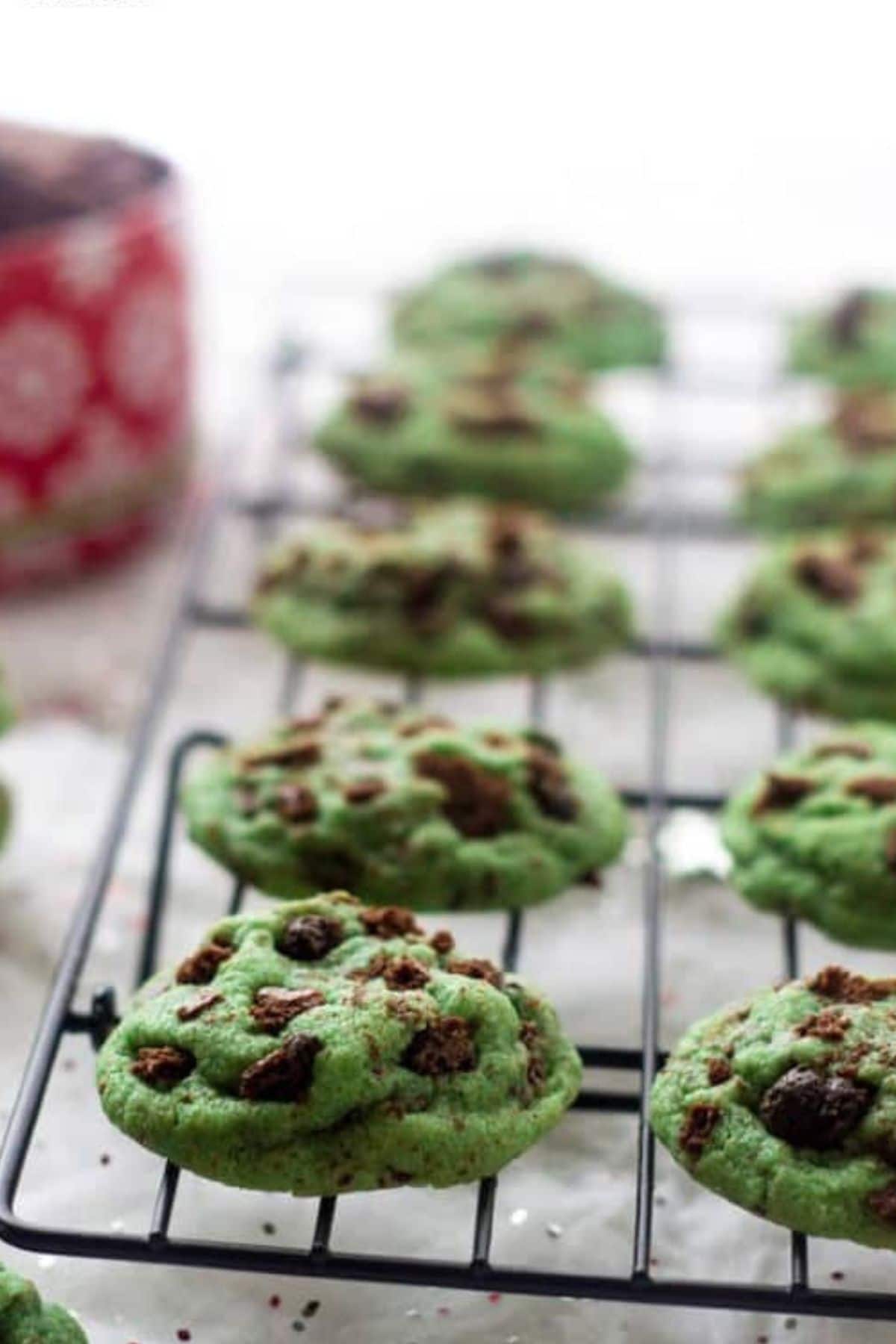 Mint chocolate cookies on wire rack.