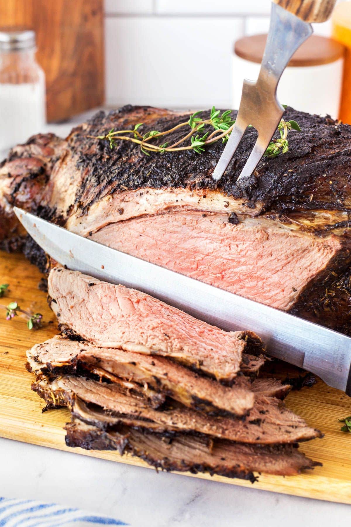 Leg of lamb slices on cutting board.