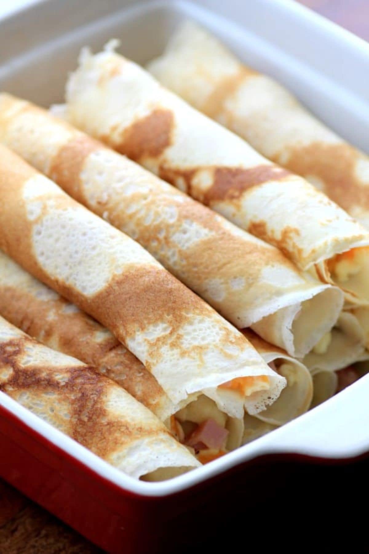 Crepes in baking dish.