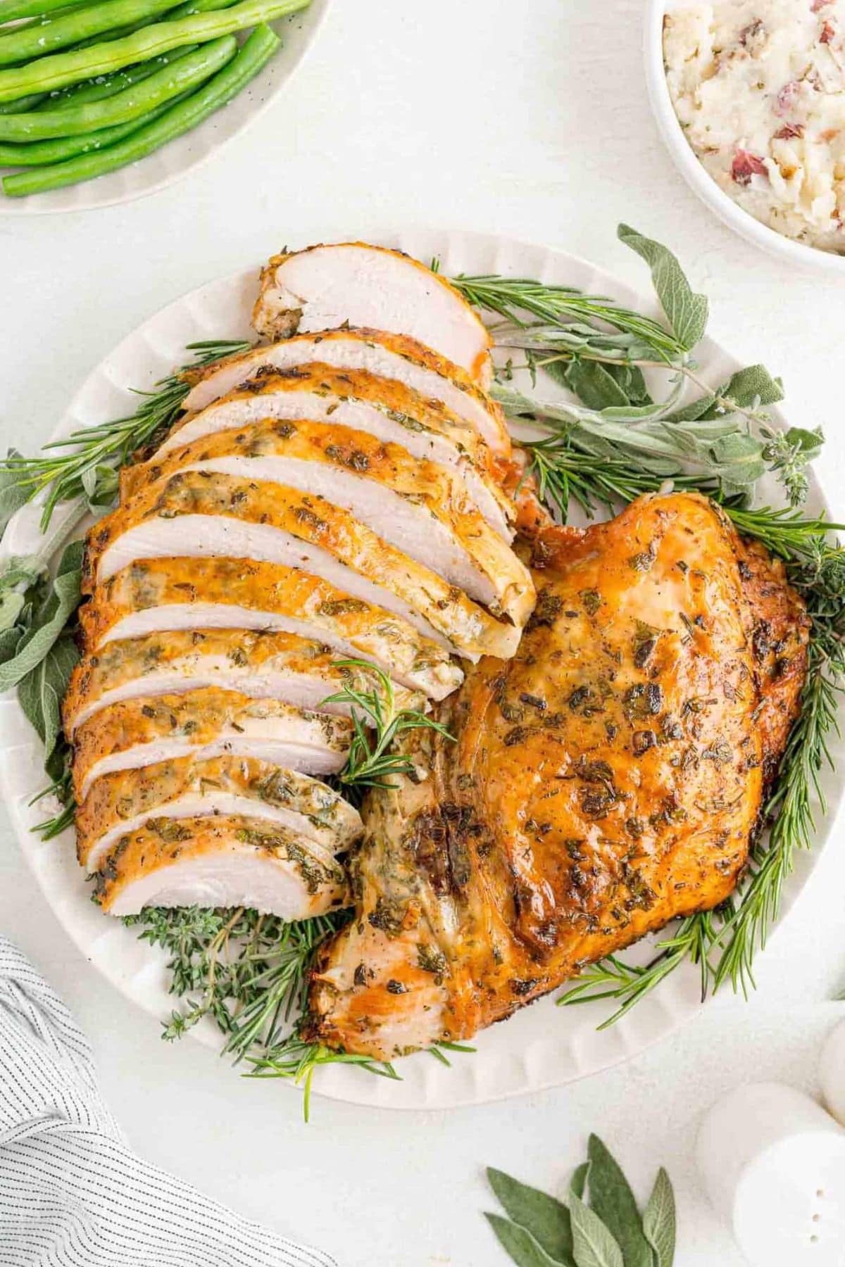 Roasted turkey breast on platter.