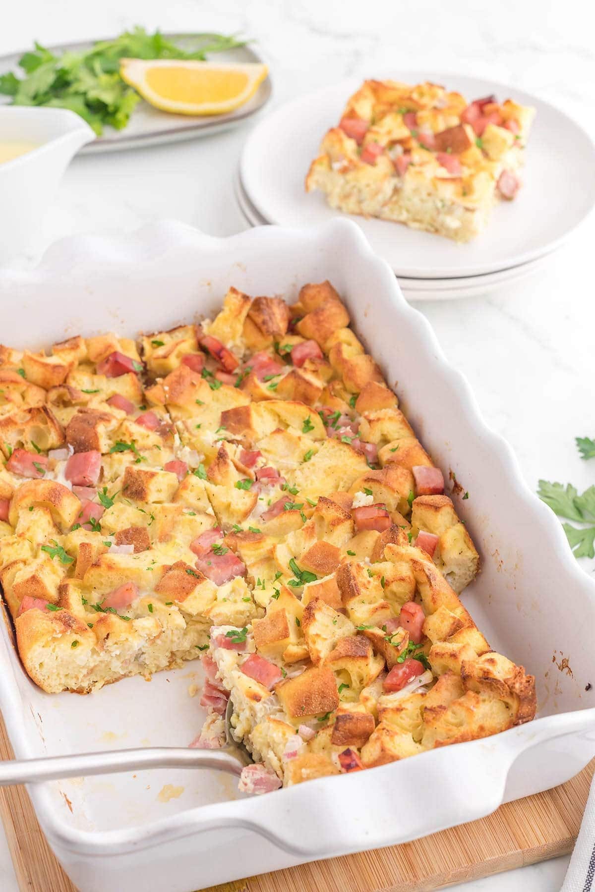 Eggs benedict casserole in dish.