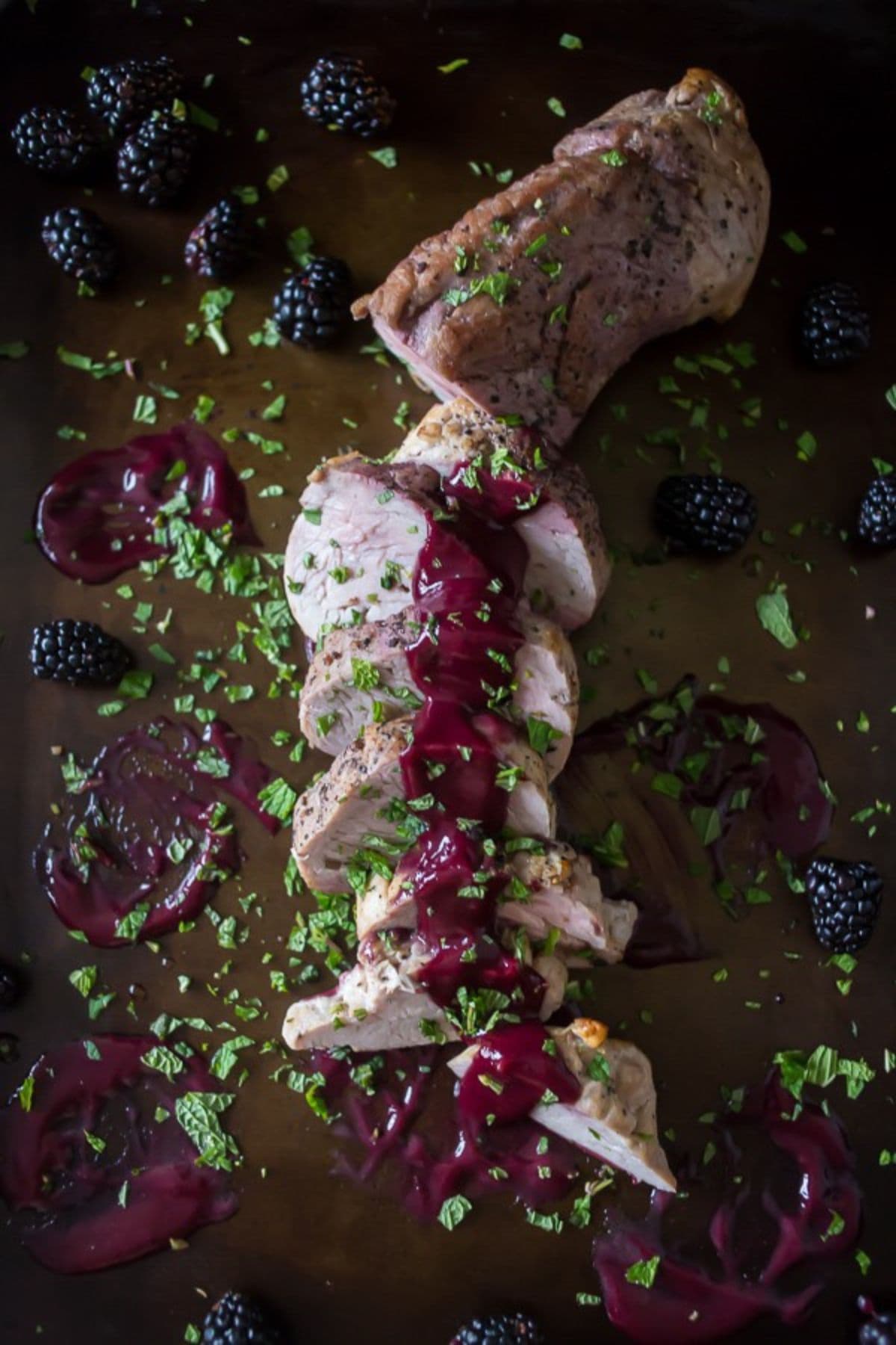 Pork tenderloin on platter.