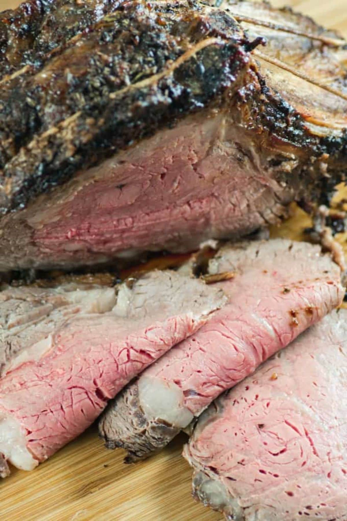 Roast beef on cutting board.