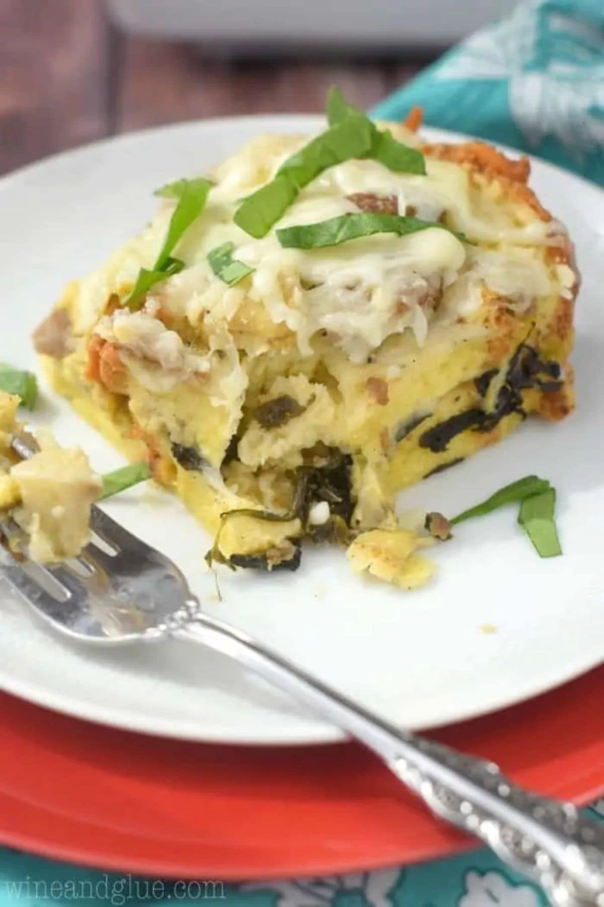 Spinach artichoke strata on plate.