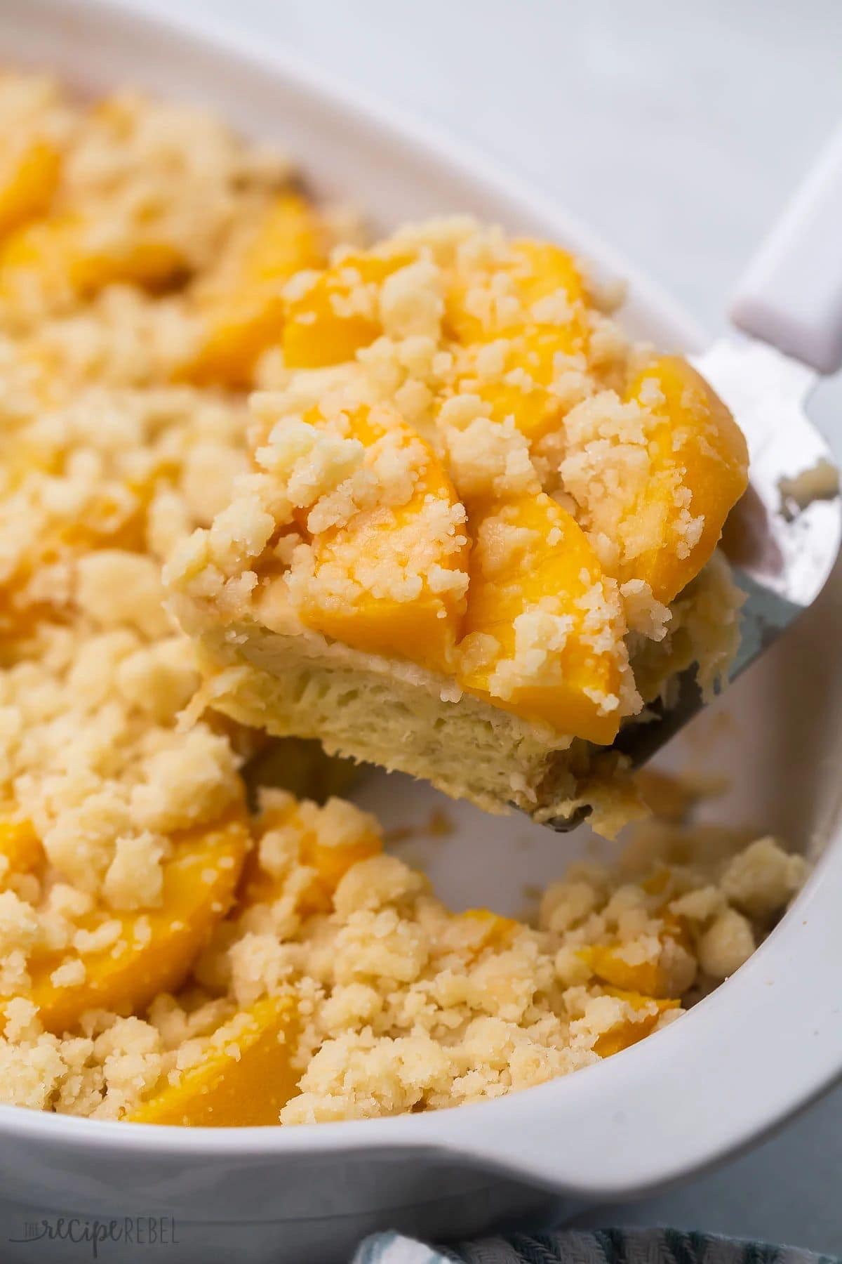 Peach cobbler french toast in baking dish.