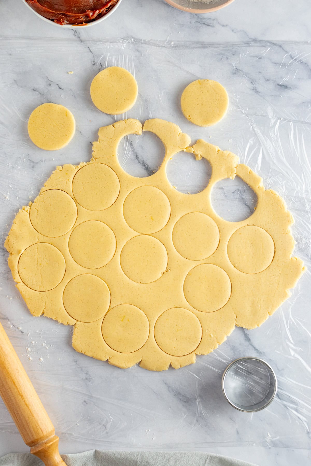 Cutting out the cookie dough. 