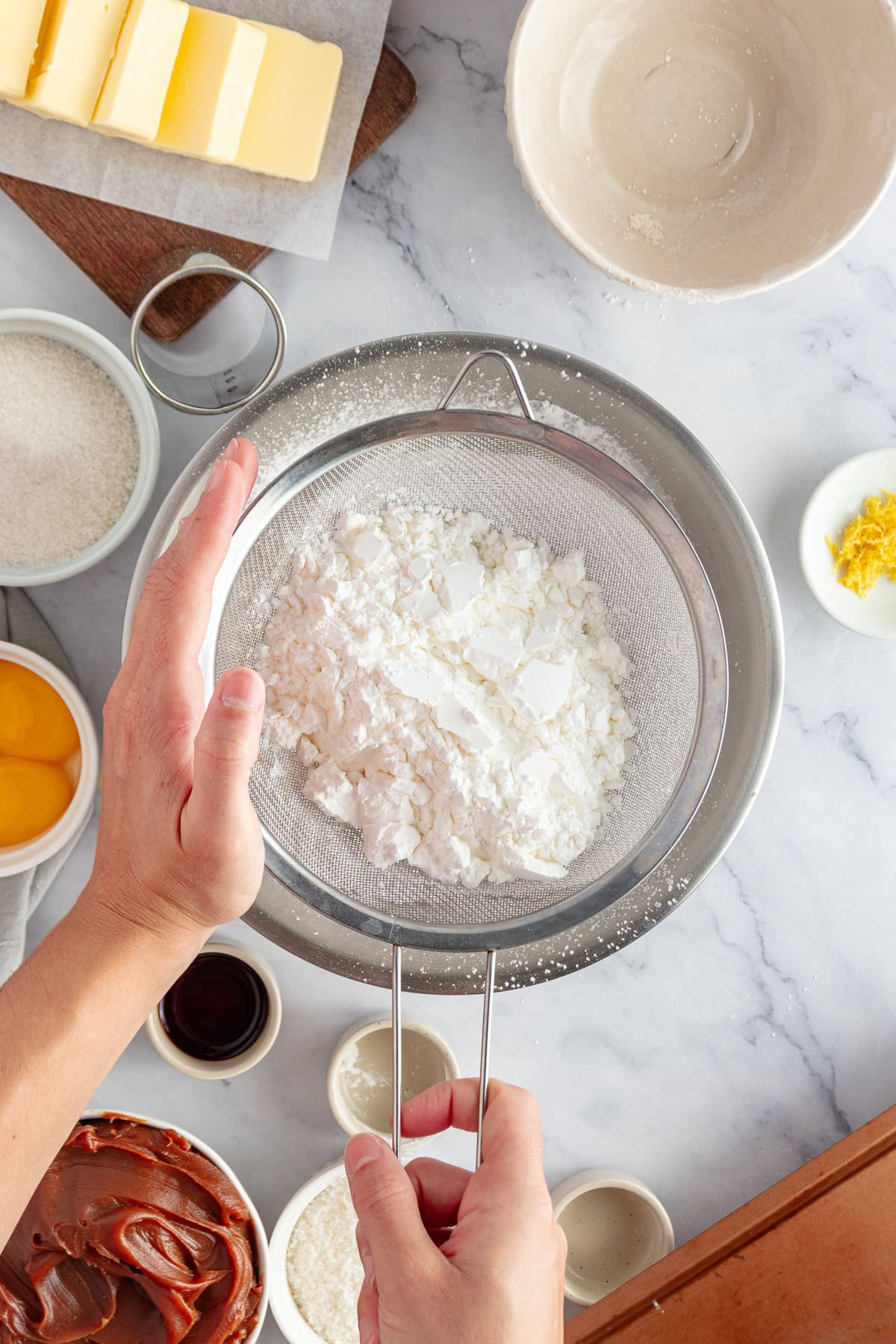 Sifting dry ingredients.