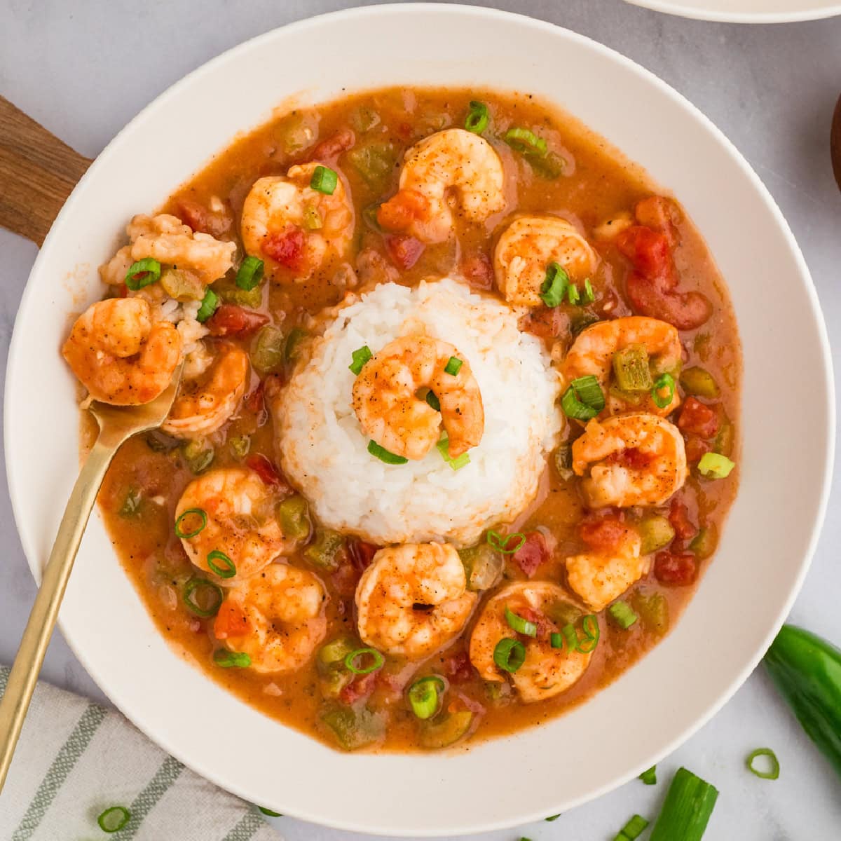 Taking a forkful of Etouffee. 