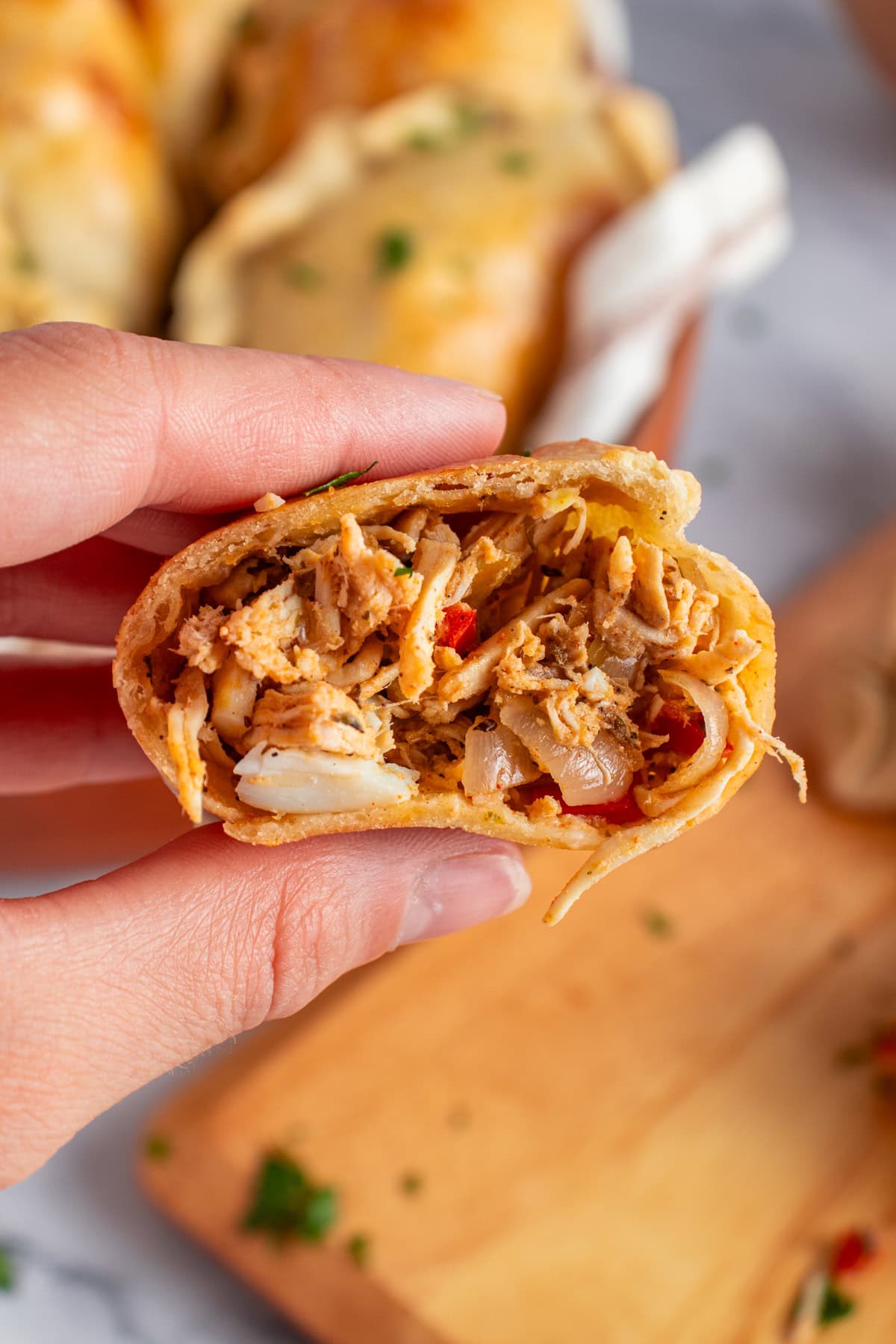 Chicken Empanada showing its filling.