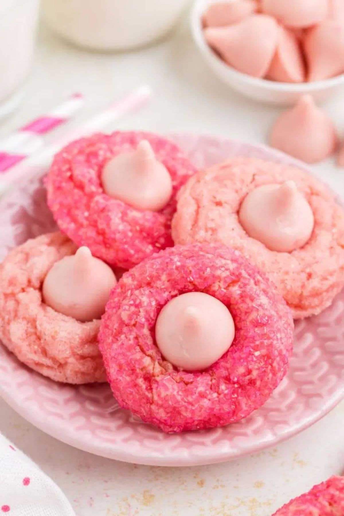 Strawberry cookies on a plate.