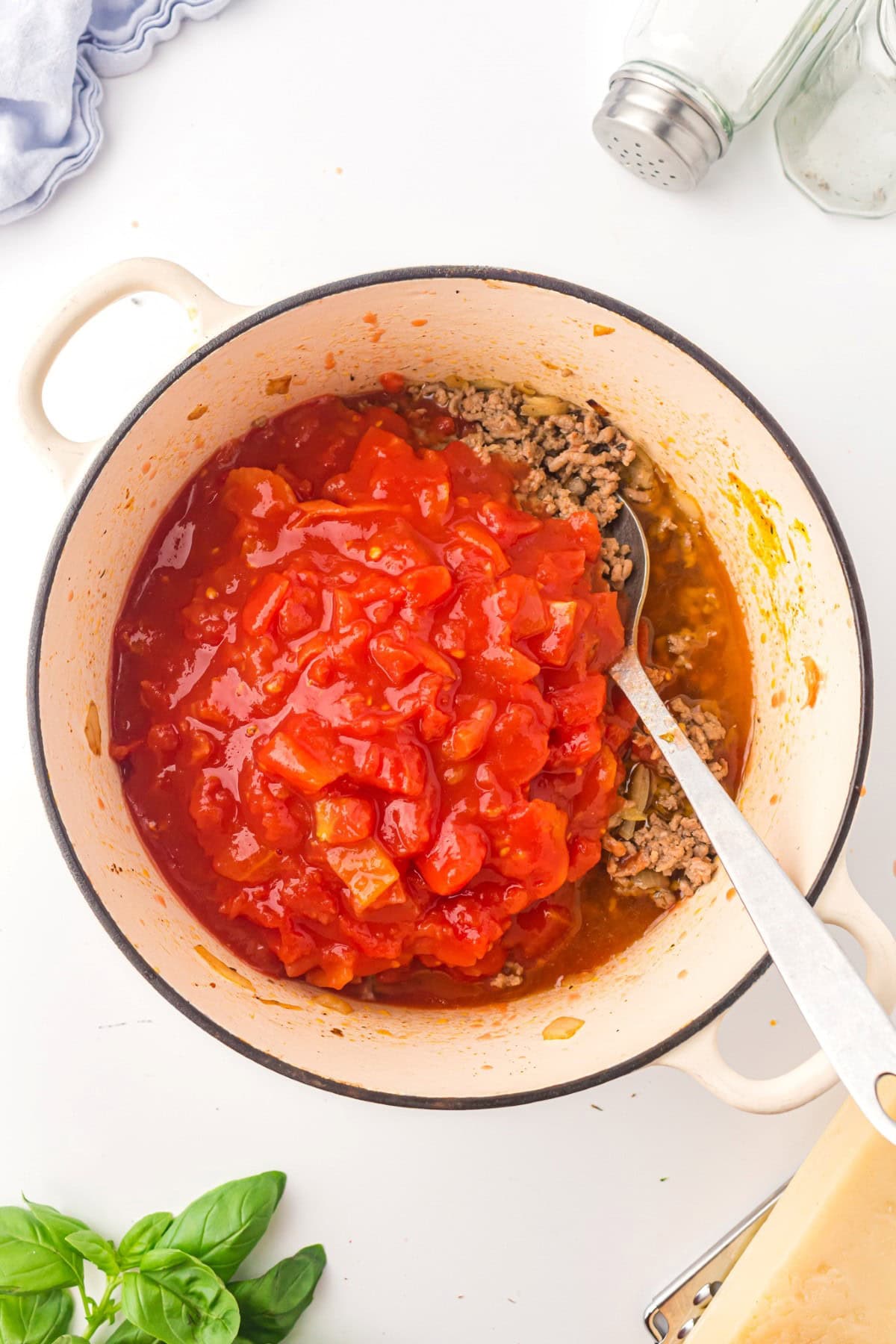 Adding in tomatoes.