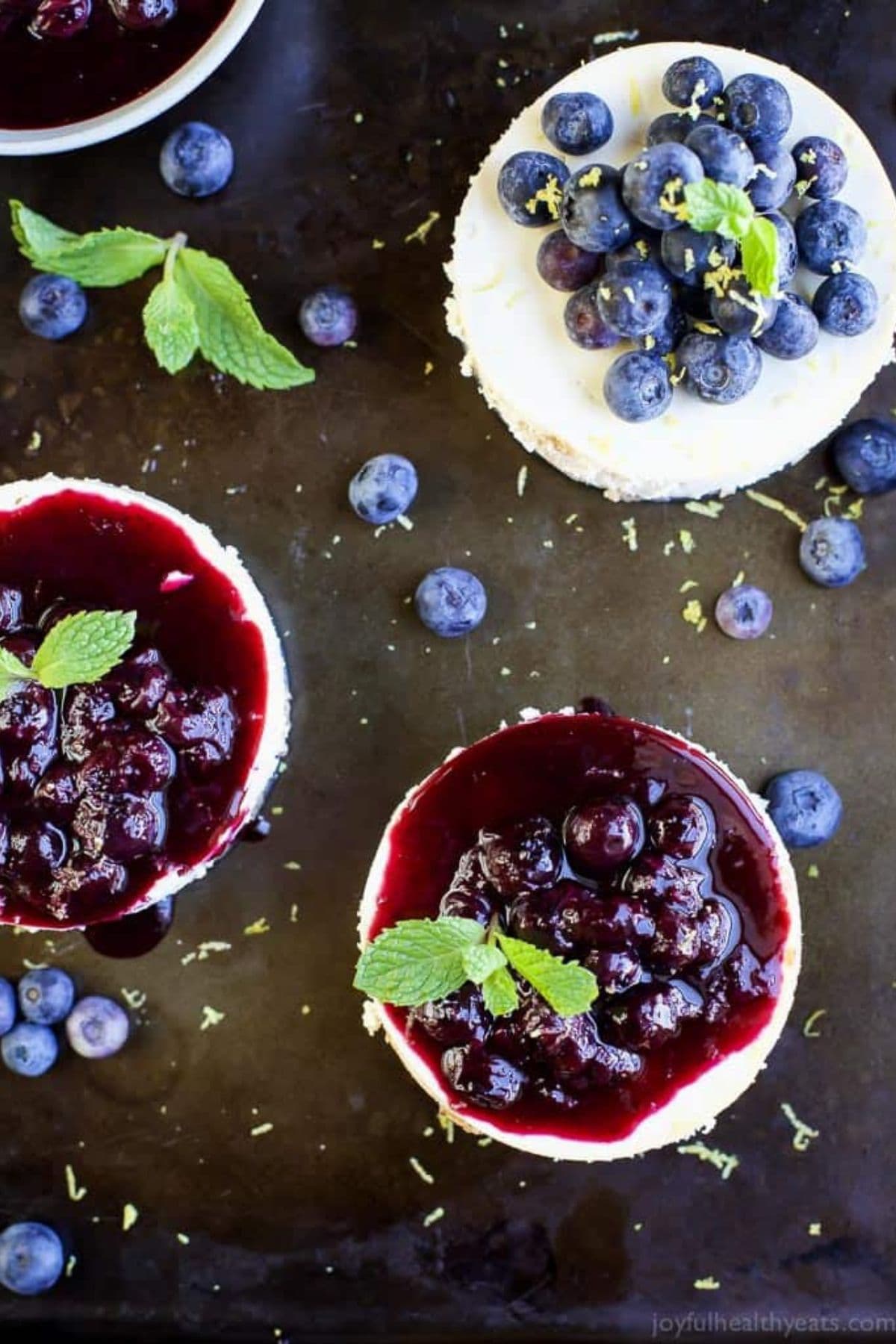 Goat cheese cakes on a counter.