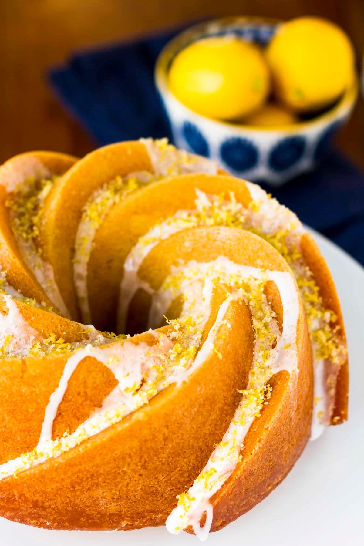 Lemon bundt cake on platter.