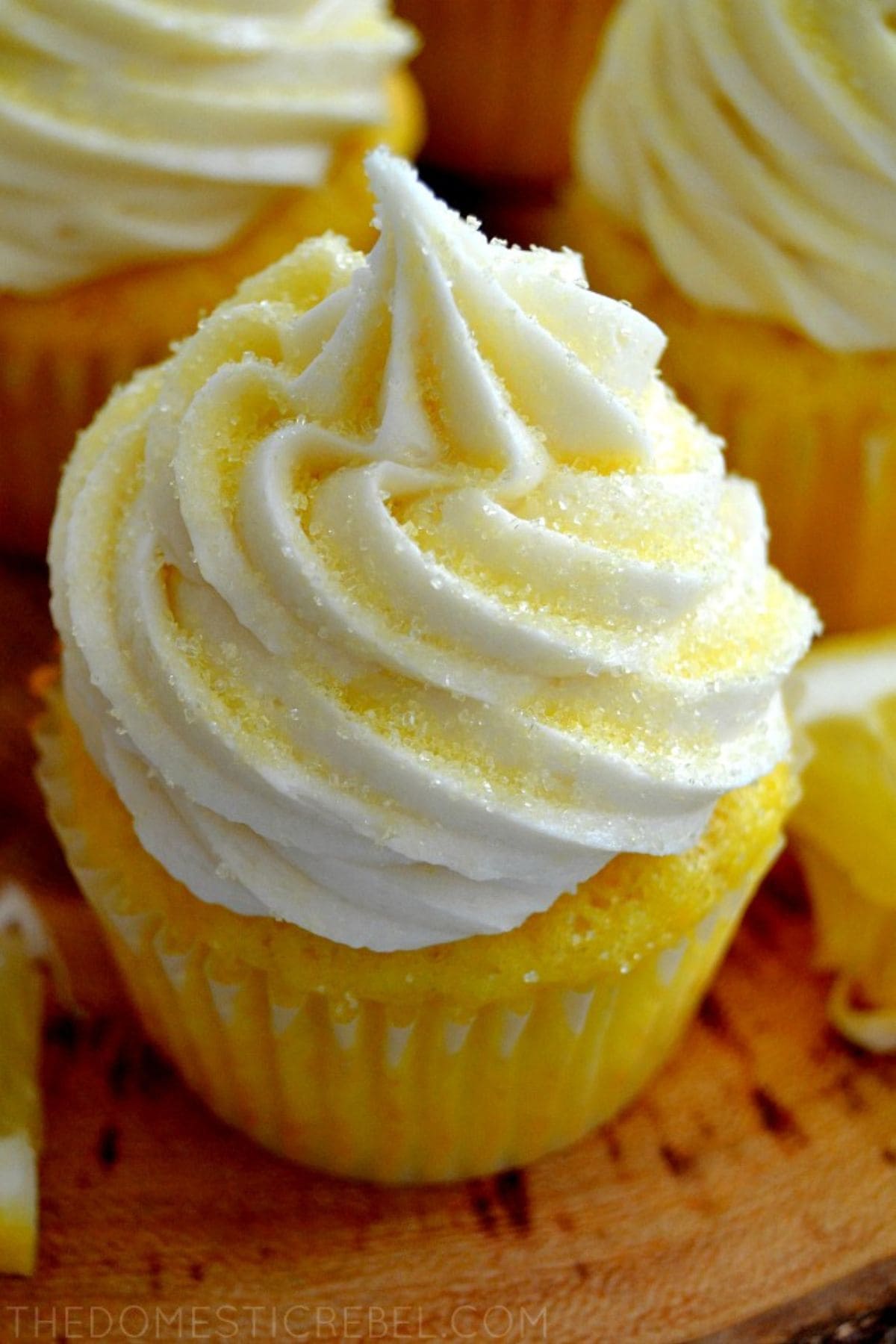 Lemon cupcake on a serving tray.