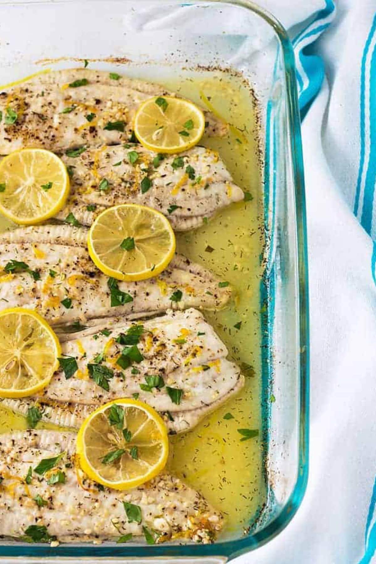 Lemon flounder in baking dish.