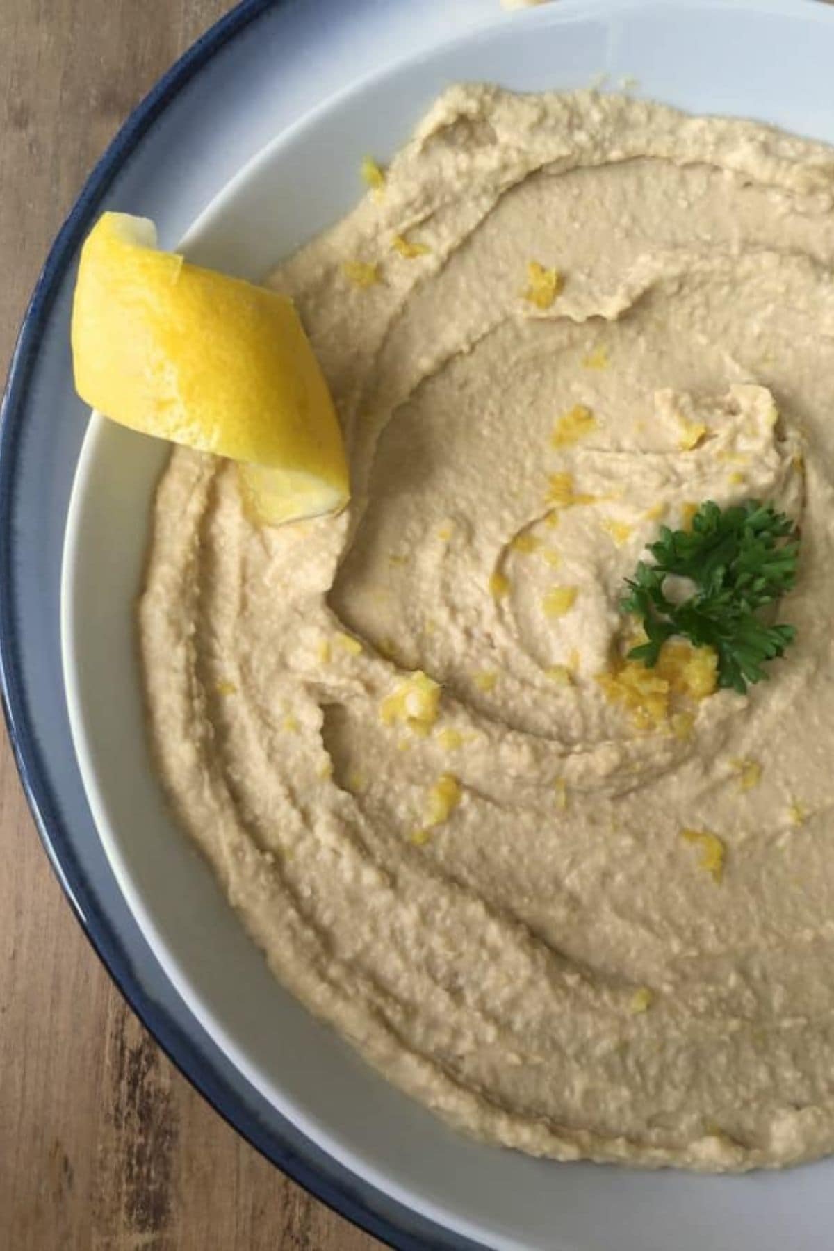 Bowl of lemon hummus.