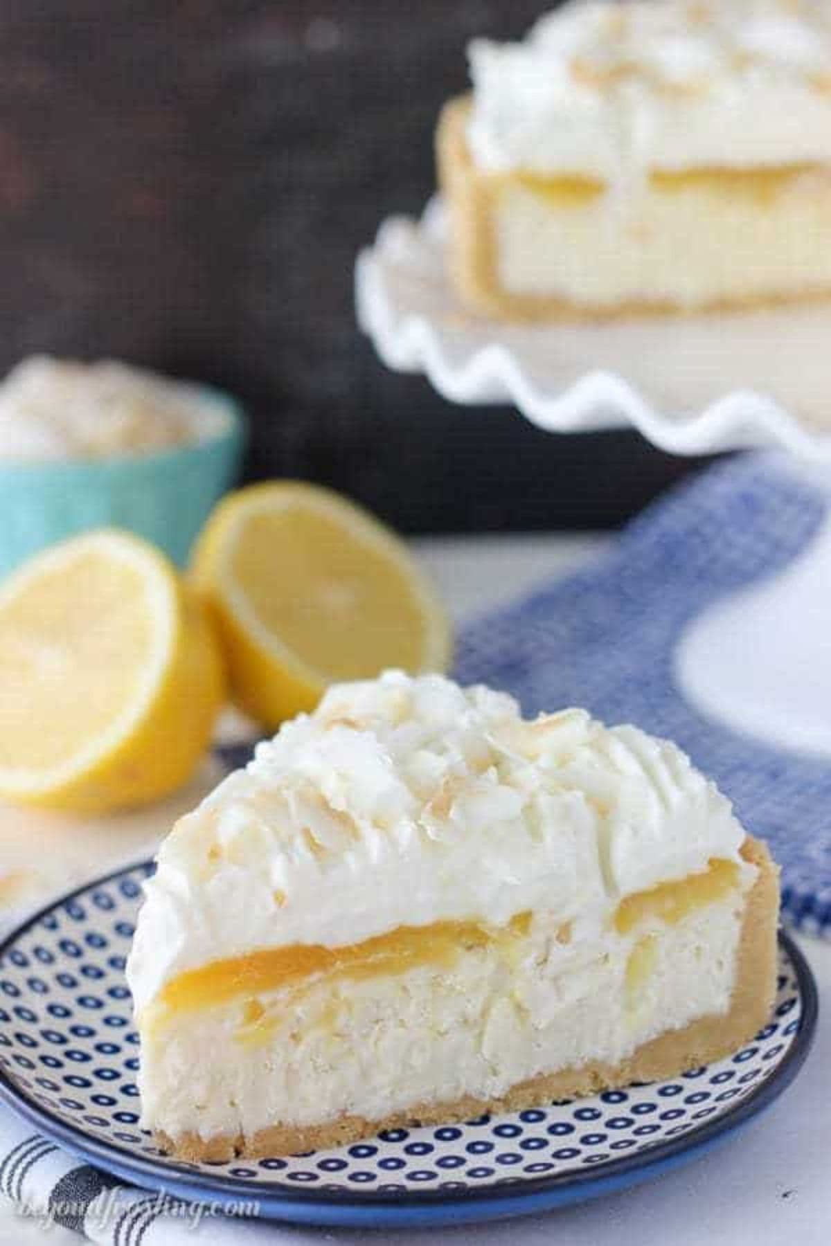 Slice of lemon macaroon cheesecake on plate.