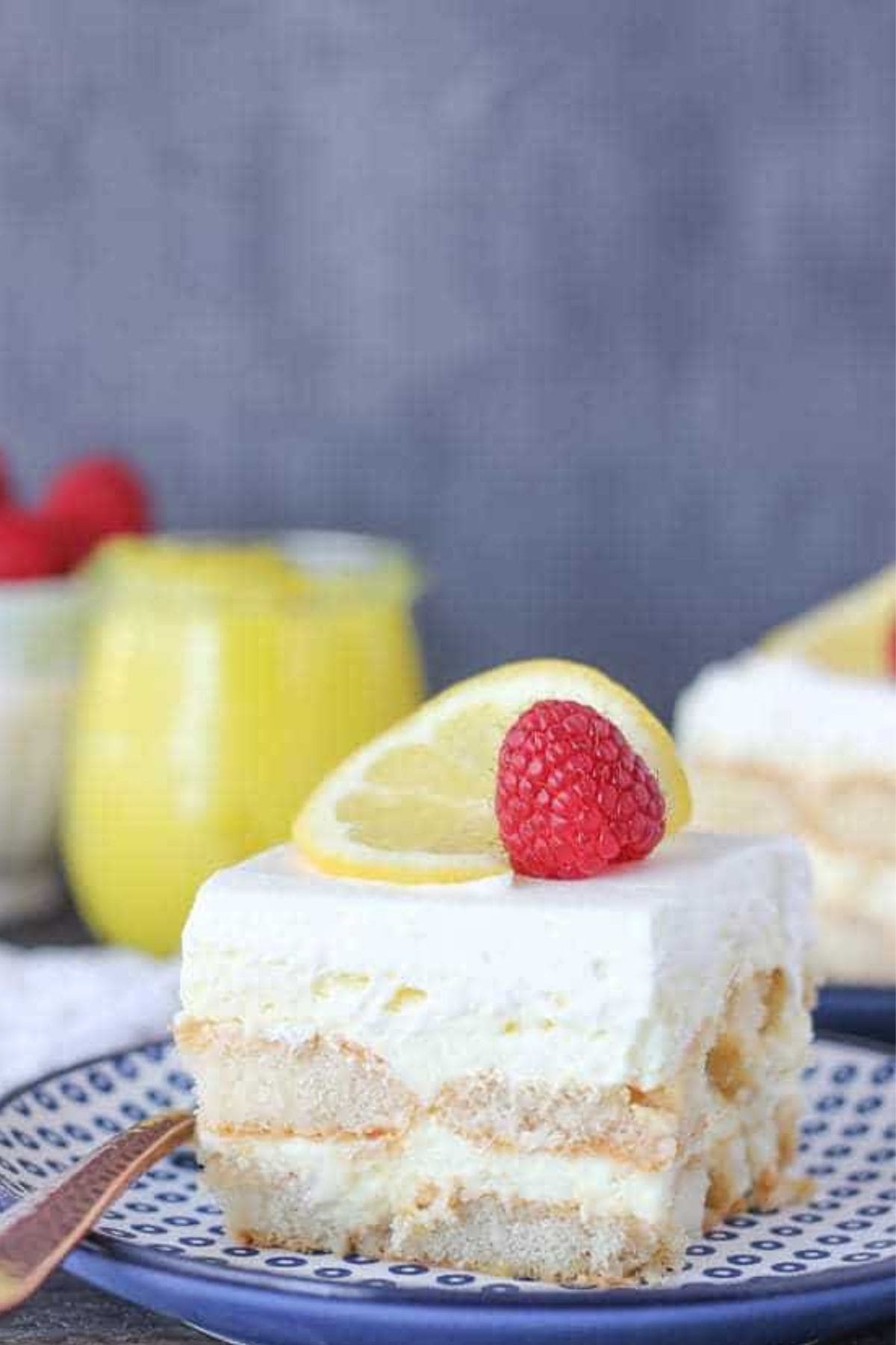 Slice of lemon icebox cake on a plate.