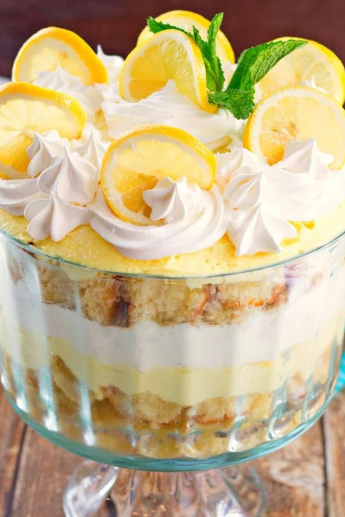 Lemon trifle in a glass bowl.