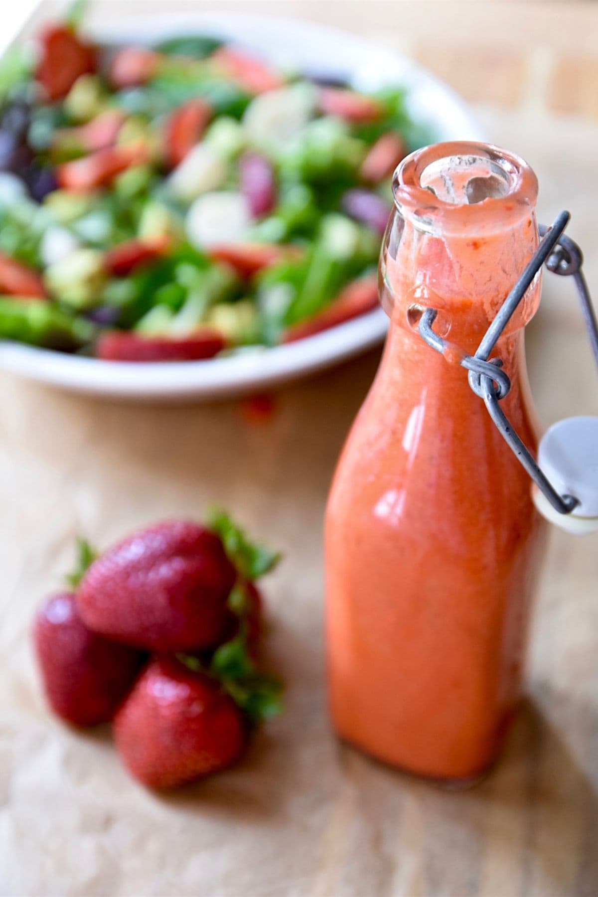 Bottle of strawberry lemon poppyseed dressing.