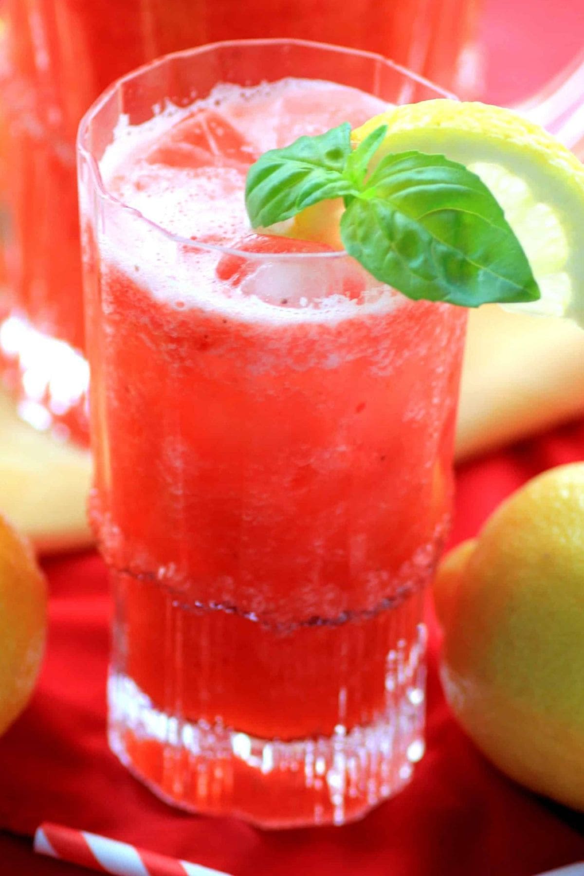 Strawberry pineapple lemonade in a glass.