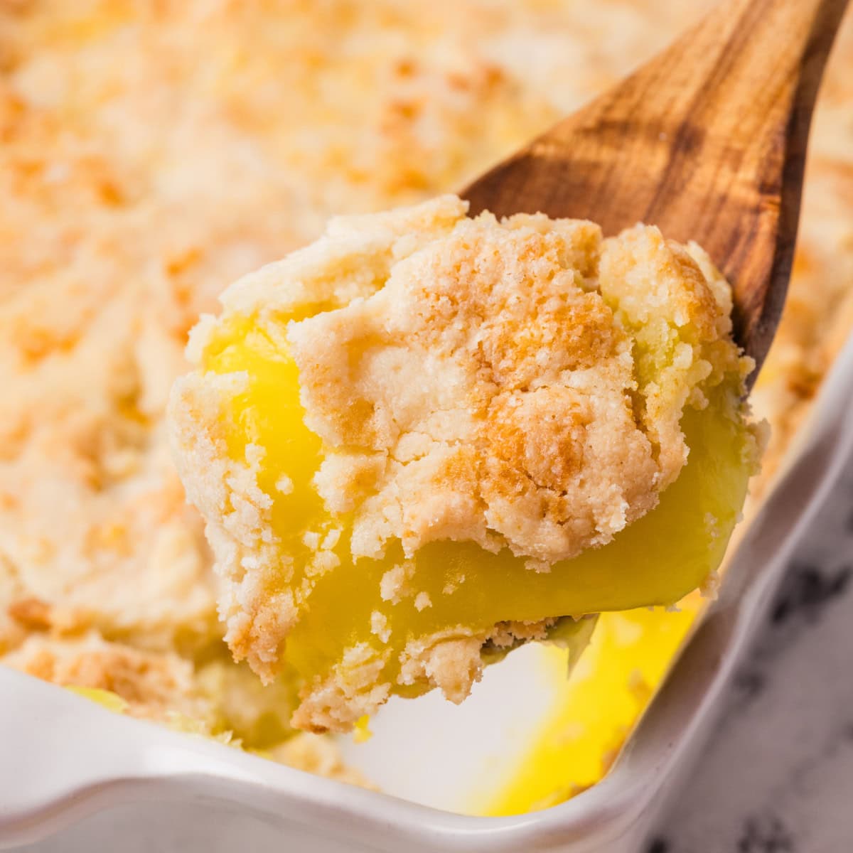 Need a quick and easy recipe? This Lemon Dump Cake is not only easy but delicious. It transports well, making a great potluck offering, and is summery and bright. Lemon lovers will be thrilled. Spoonful of cake.