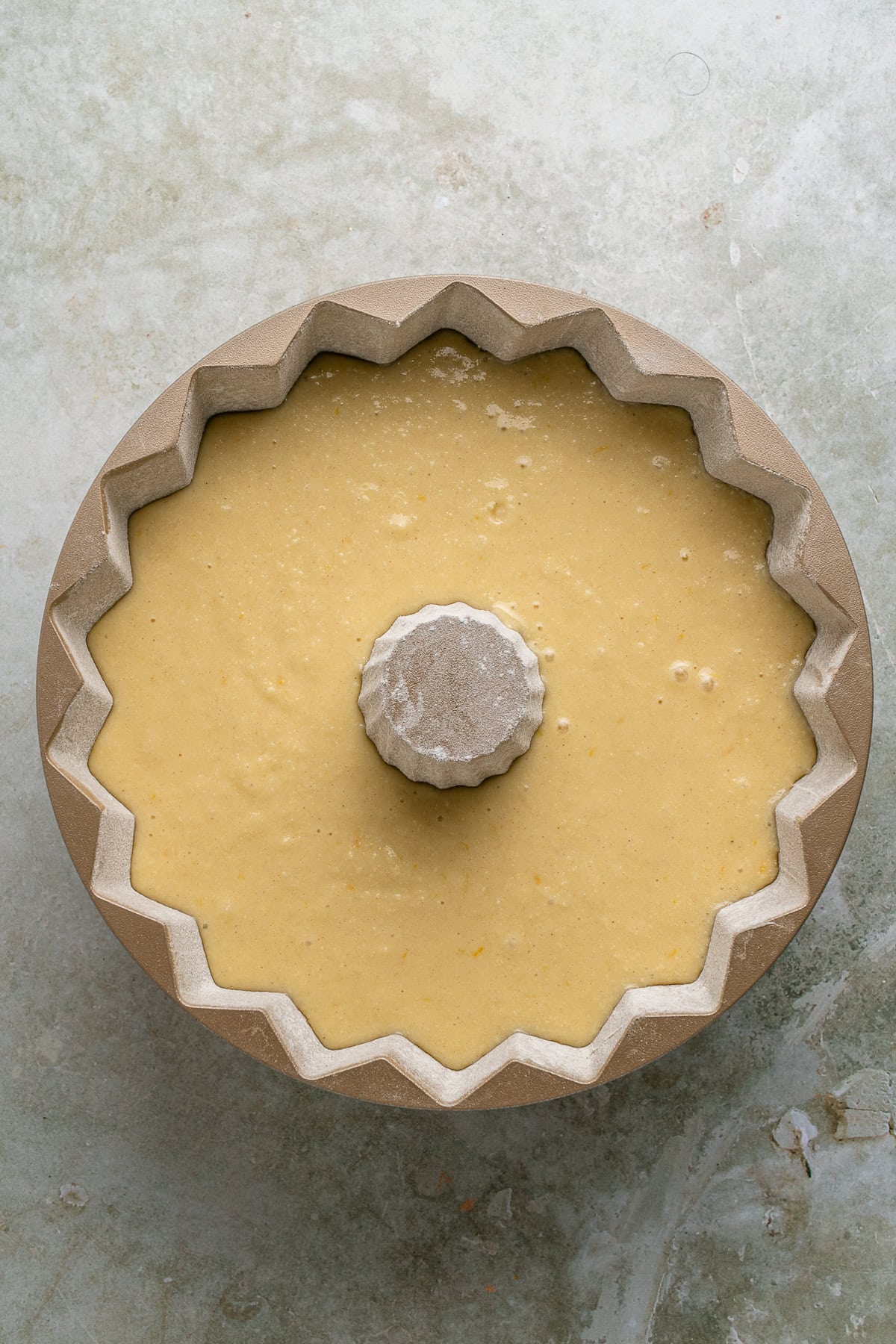 This Limoncello Cake is filled with luscious ingredients like lemon juice, lemon zest and limoncello to give you a lovely citrus flavor to this rich and butter cake. Batter in pan.