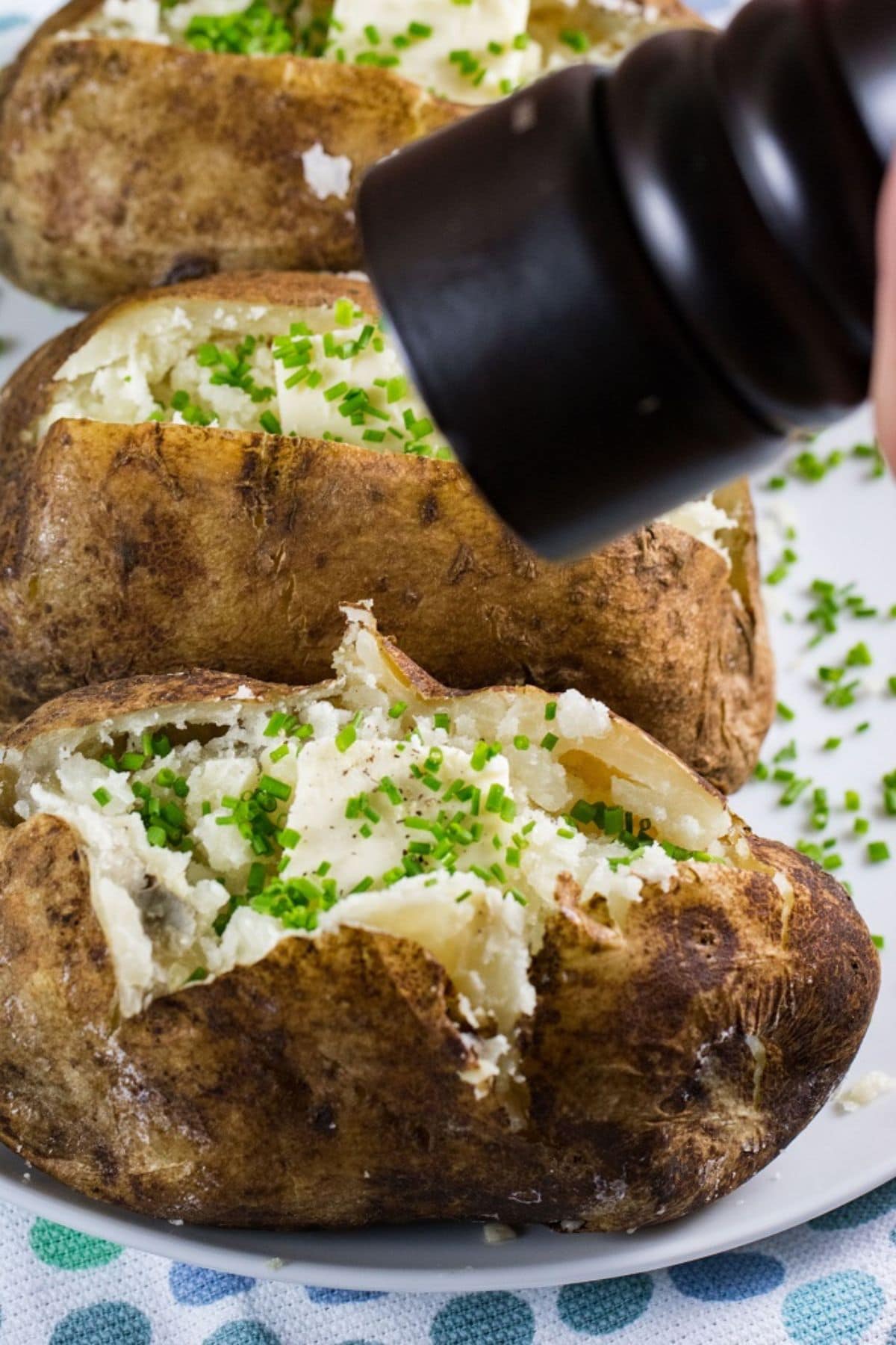 Baked potatoes on a plate.