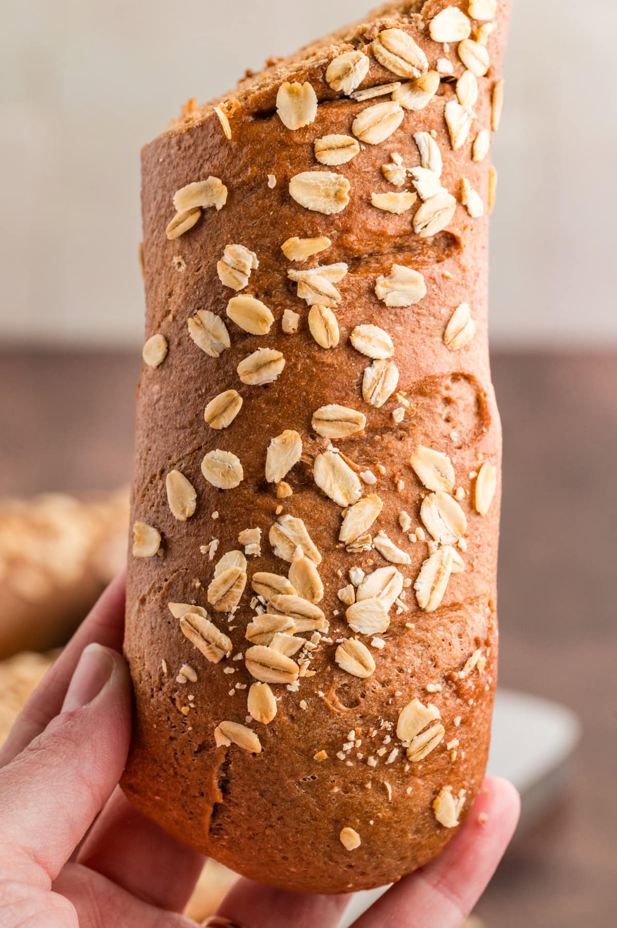 Holding up part of a loaf. 