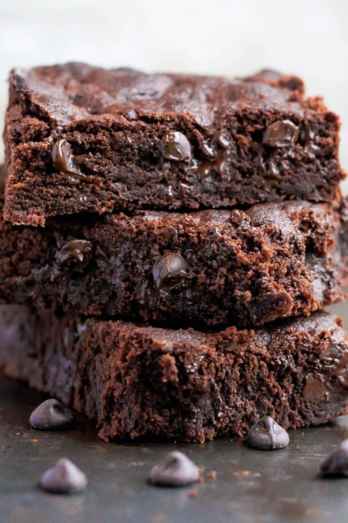 Get outside and enjoy the day with these 50 Picnic Basket Essentials. There is something for everyone to pack the perfect picnic and enjoy family time and the great outdoors. Double Chocolate Chip Bars stacked on top of each other.