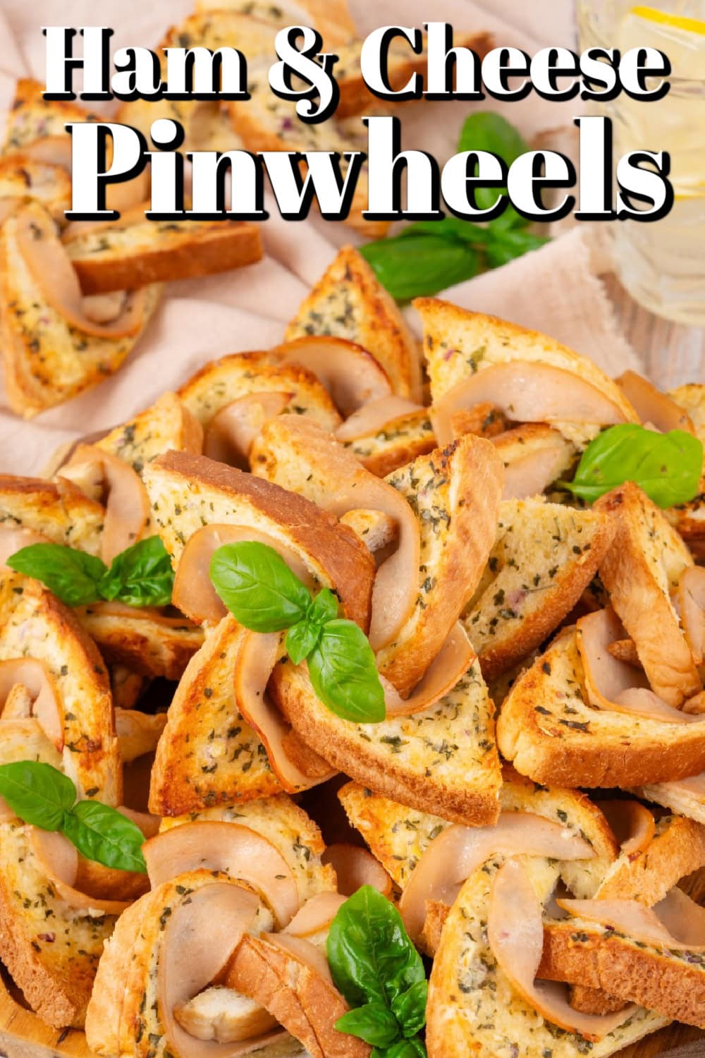 What fun are these Ham and Cheese Pinwheels, but best of all, they taste amazing. Your kids are going to ask for them all the time!! Ham and Cheese Pinwheels Pin.