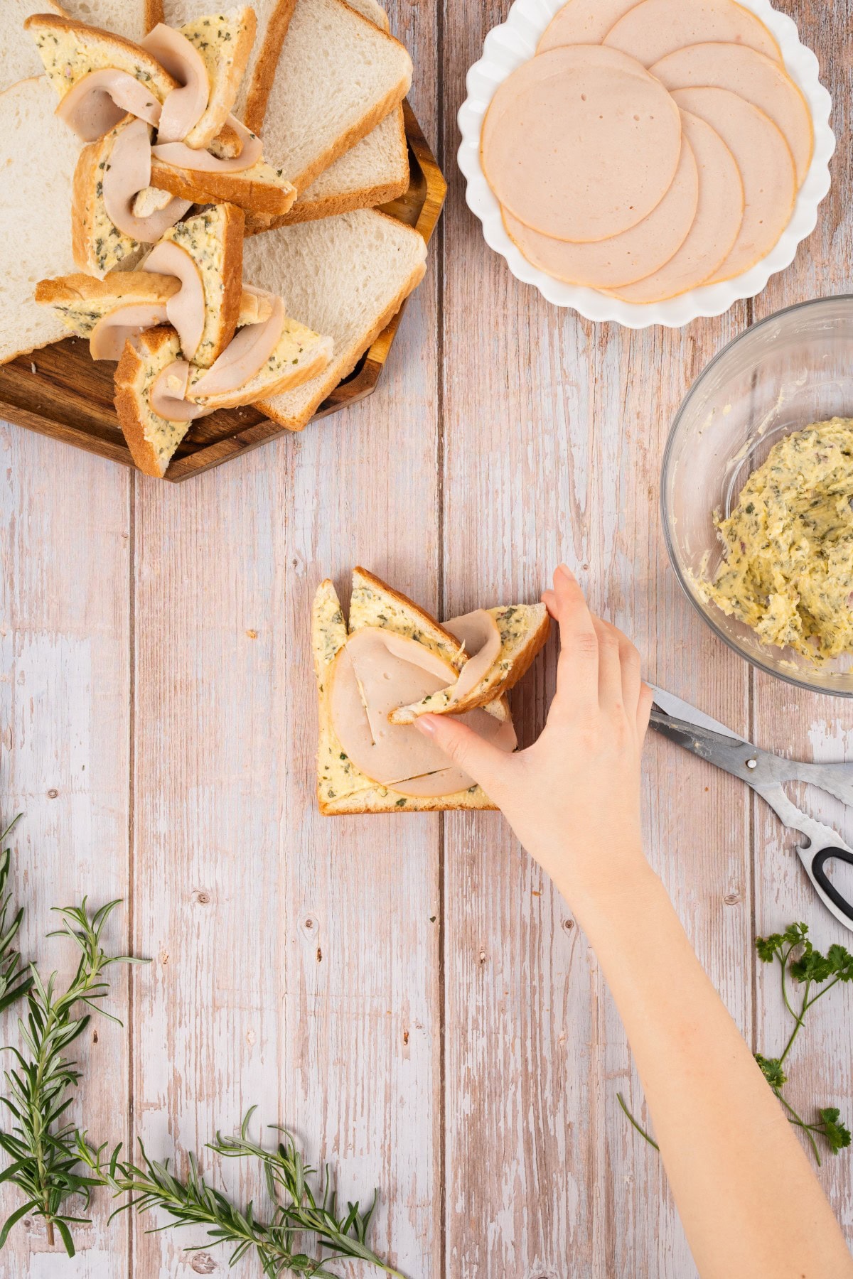 What fun are these Ham and Cheese Pinwheels, but best of all, they taste amazing. Your kids are going to ask for them all the time!! Continuing to fold.