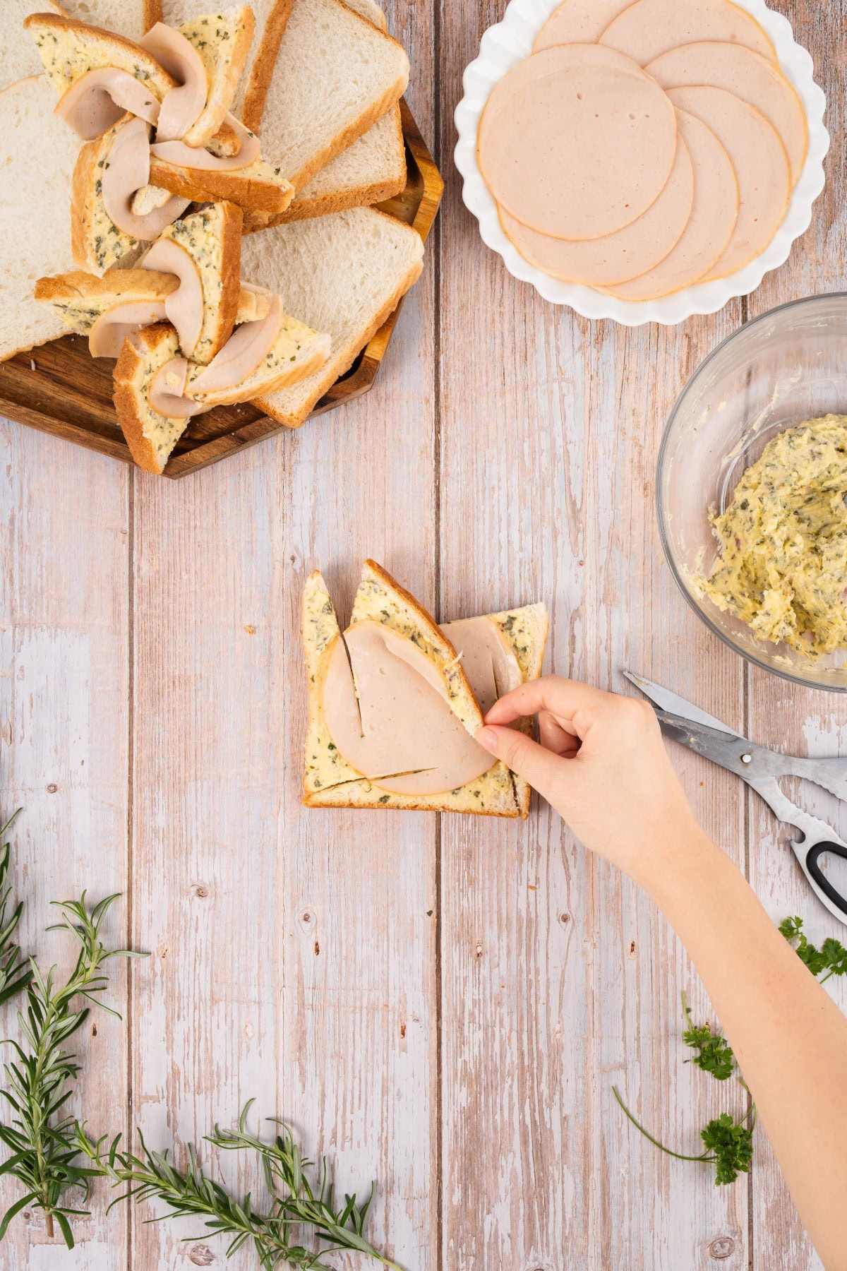 What fun are these Ham and Cheese Pinwheels, but best of all, they taste amazing. Your kids are going to ask for them all the time!! Starting to fold.