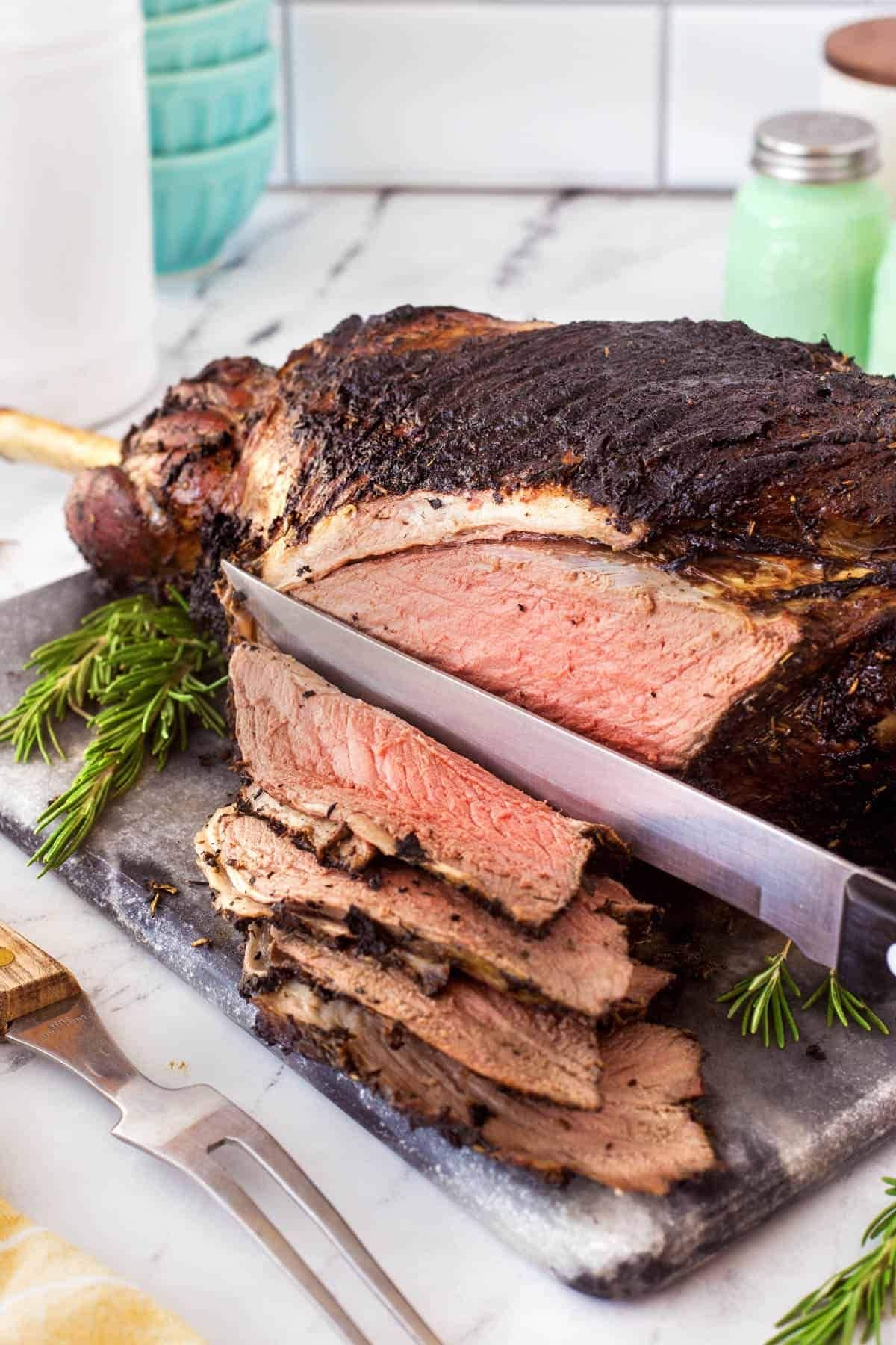 Leg of lamb being carved.