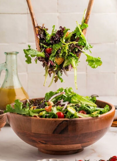 Taking a large serving of Italian Chopped Salad.