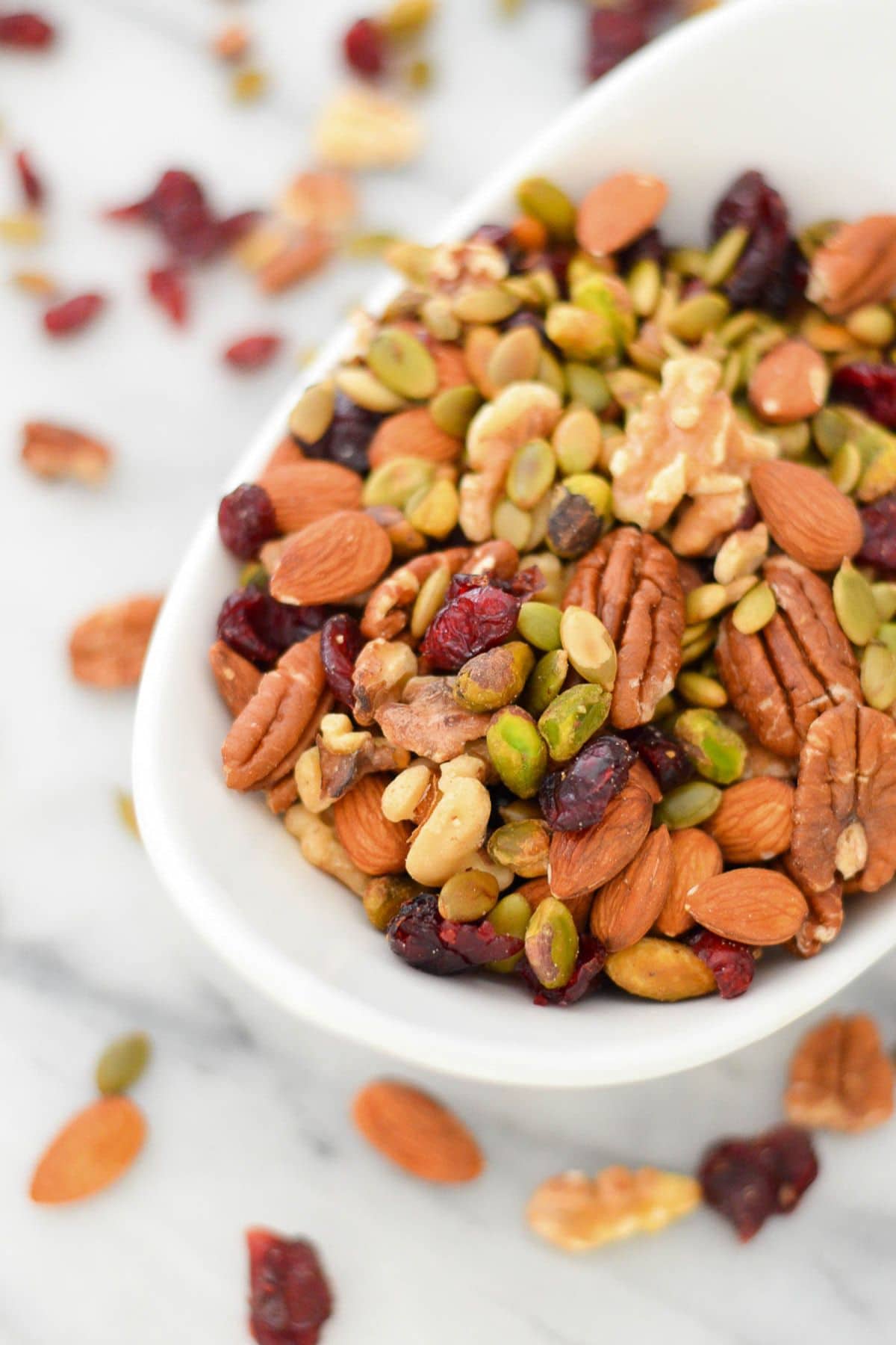 Get outside and enjoy the day with these 50 Picnic Basket Essentials. There is something for everyone to pack the perfect picnic and enjoy family time and the great outdoors. Bowl of omega 3 trail mix.