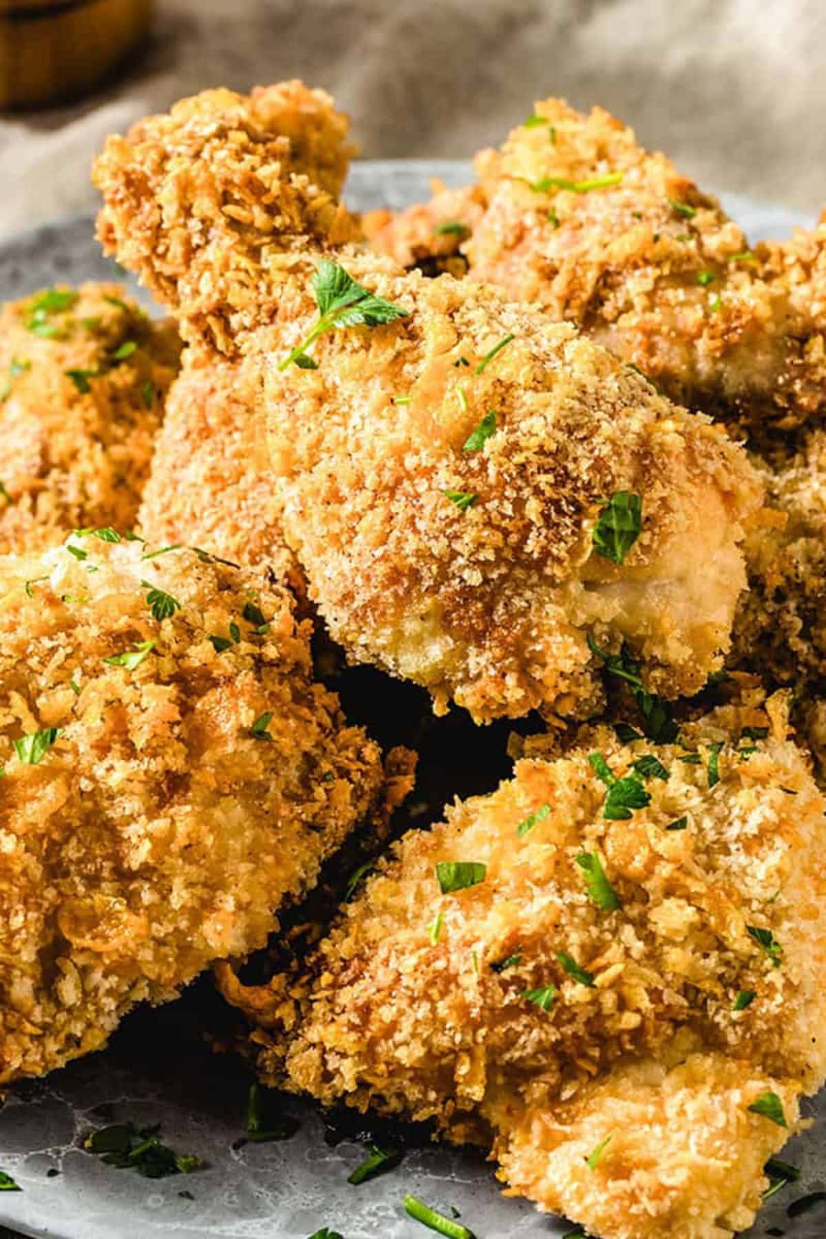 Get outside and enjoy the day with these 50 Picnic Basket Essentials. There is something for everyone to pack the perfect picnic and enjoy family time and the great outdoors. Fried chicken on a platter.