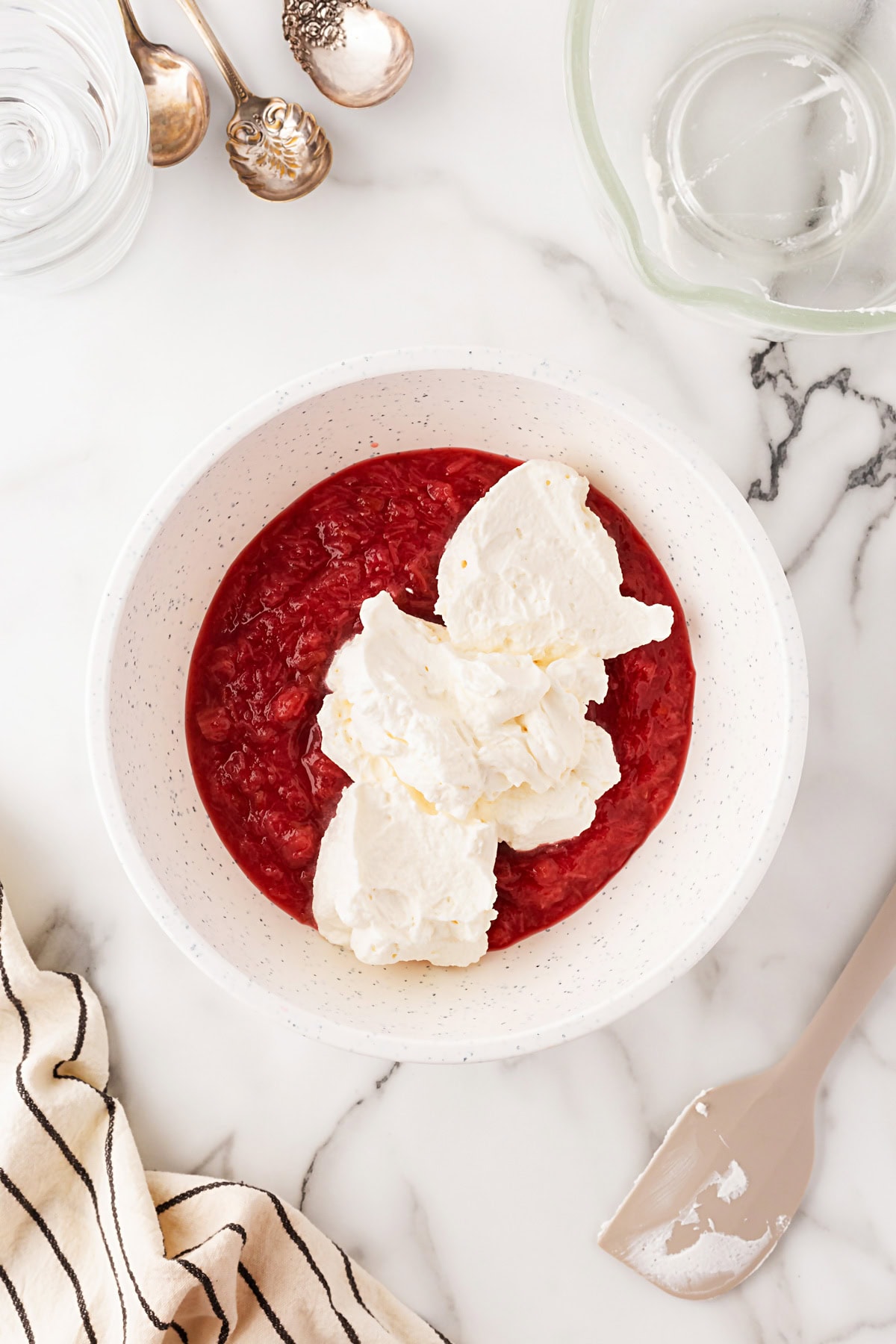 A delightful Rhubarb Fool is easy to make yet offers an elegant dessert. It is perfect after a BBQ in the spring and summer, as it is light as a cloud. Whipped cream added to the rhubarb compote.