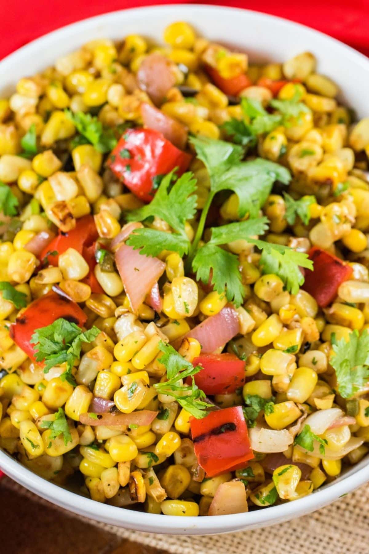 White bowl full of southwest corn salad.